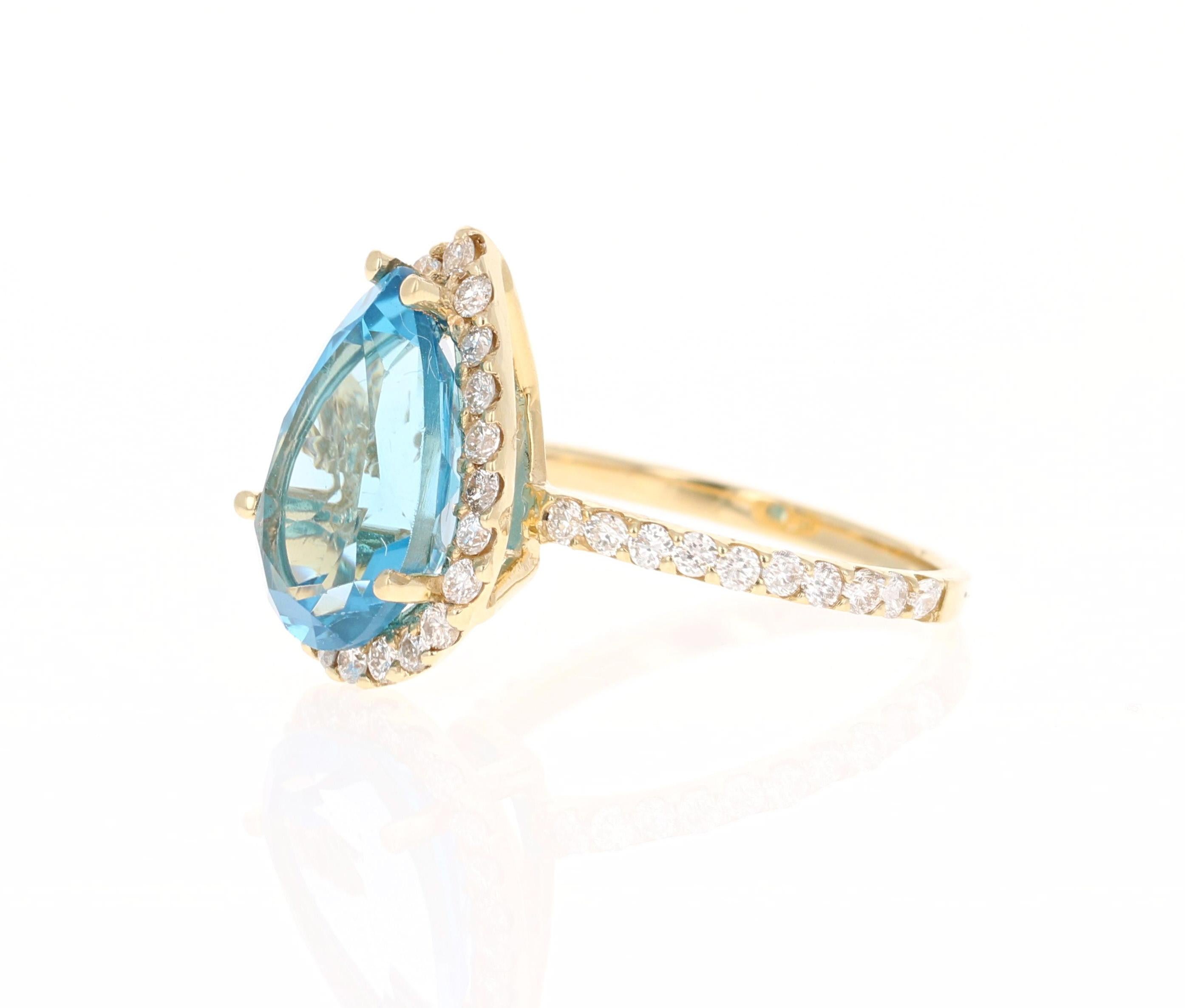 Contemporary 6.68 Carat Blue Topaz Diamond Yellow Gold Ring