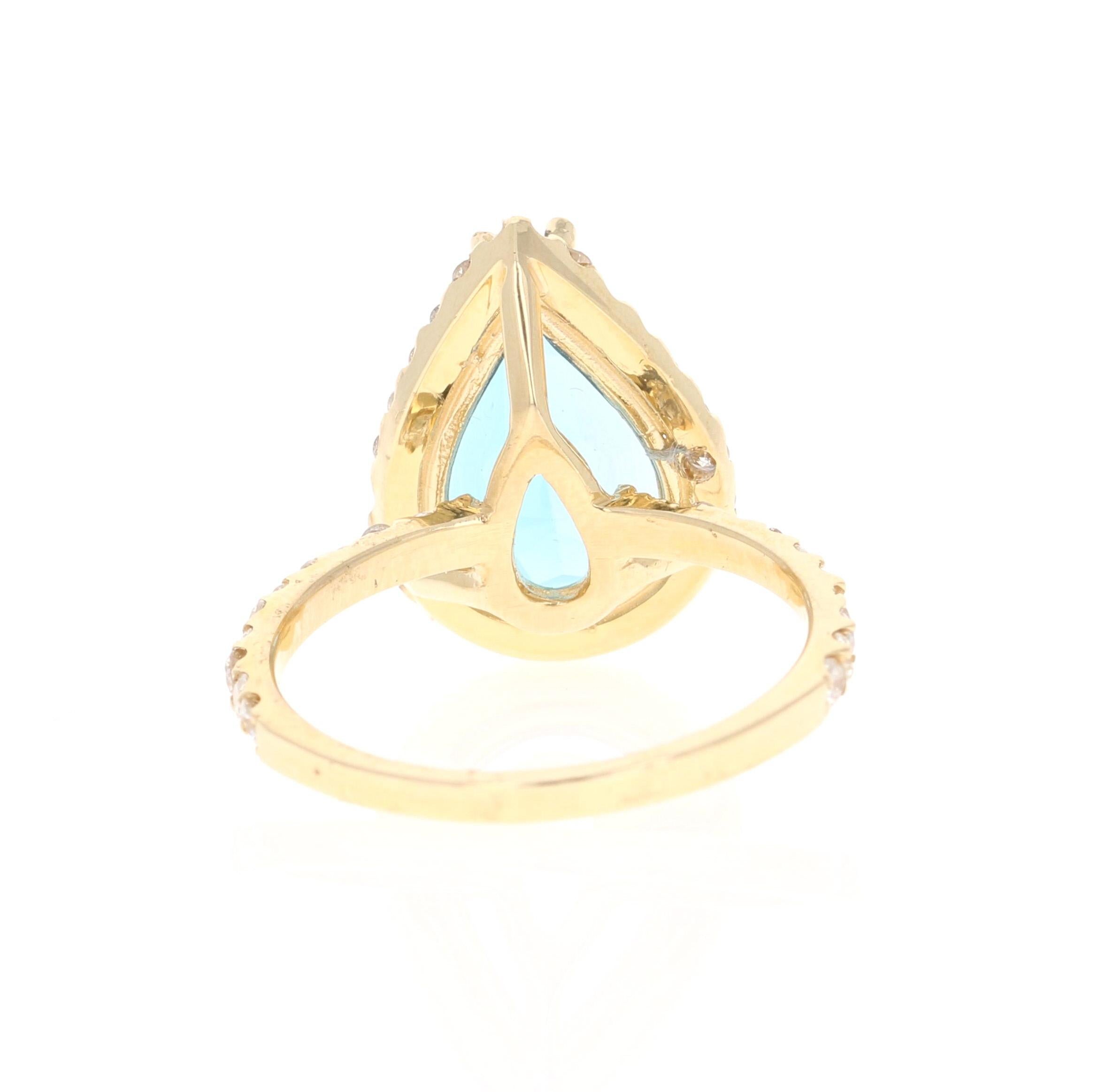 Pear Cut 6.68 Carat Blue Topaz Diamond Yellow Gold Ring