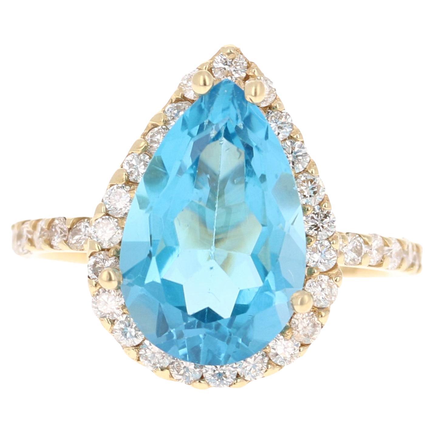 6.68 Carat Blue Topaz Diamond Yellow Gold Ring