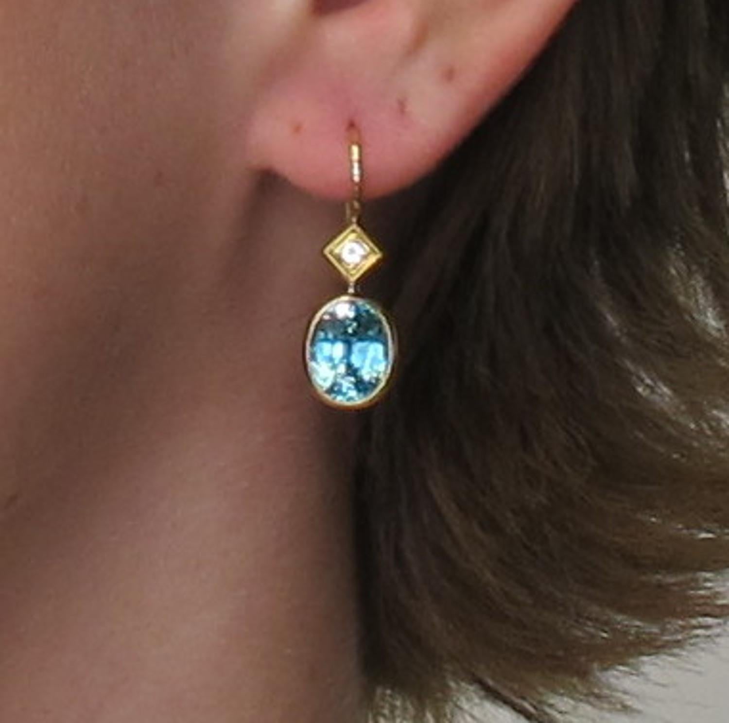 Oval Cut 6.68 Carat Blue Zircon with .08 Carat Diamonds 18 Karat Yellow Gold Earrings