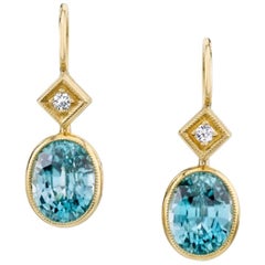 6.68 Carat Blue Zircon with .08 Carat Diamonds 18 Karat Yellow Gold Earrings