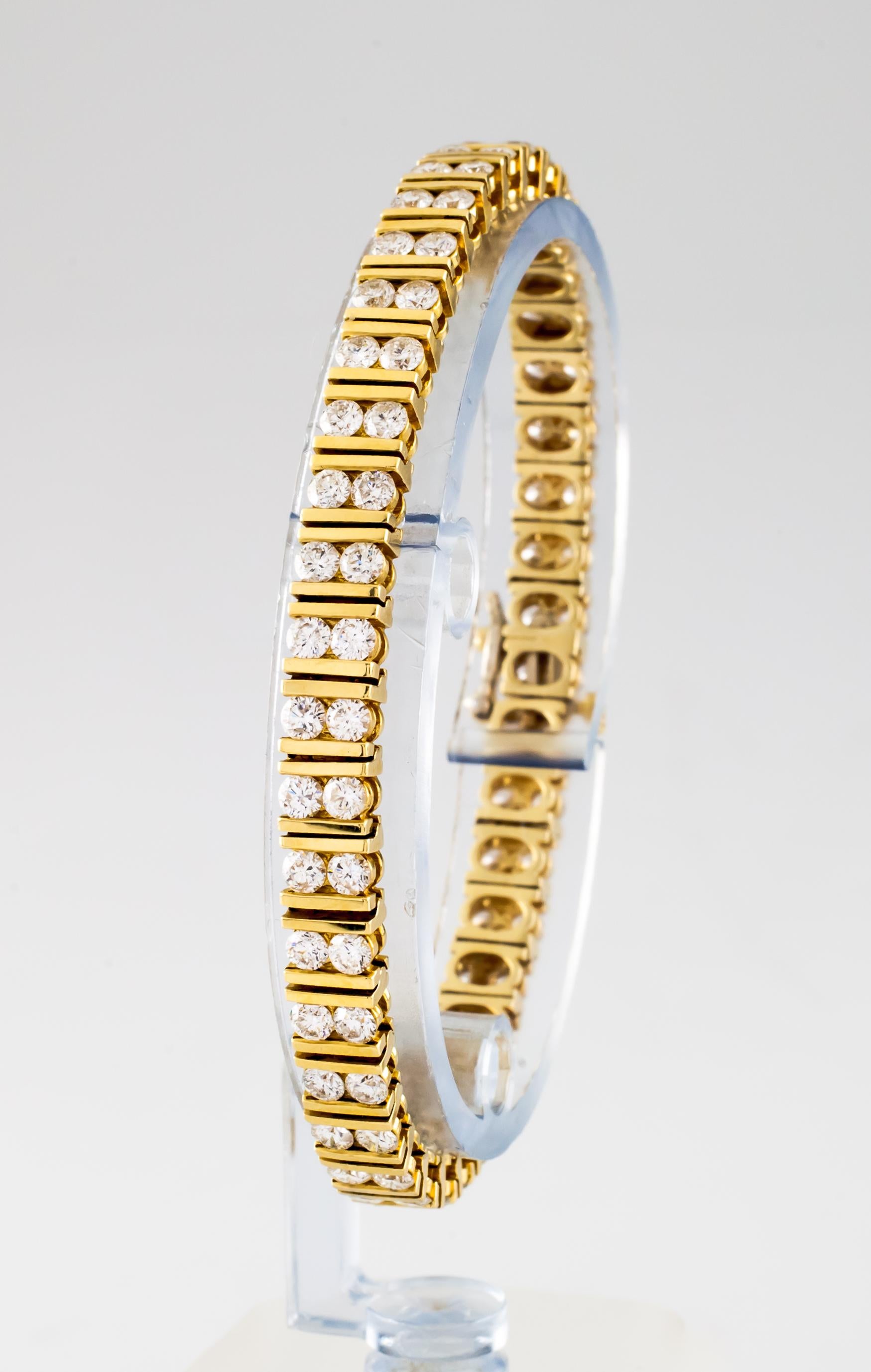 Gorgeous 14k Yellow Gold Tennis Bracelet
Unquie Double Round Brilliant Stone Station Bracelet
Total Diamond Weight = 6.58 carats
Length of bracelet = 7.25 inches 
Total Mass = 23.1 grams
Gorgeous, unique piece!