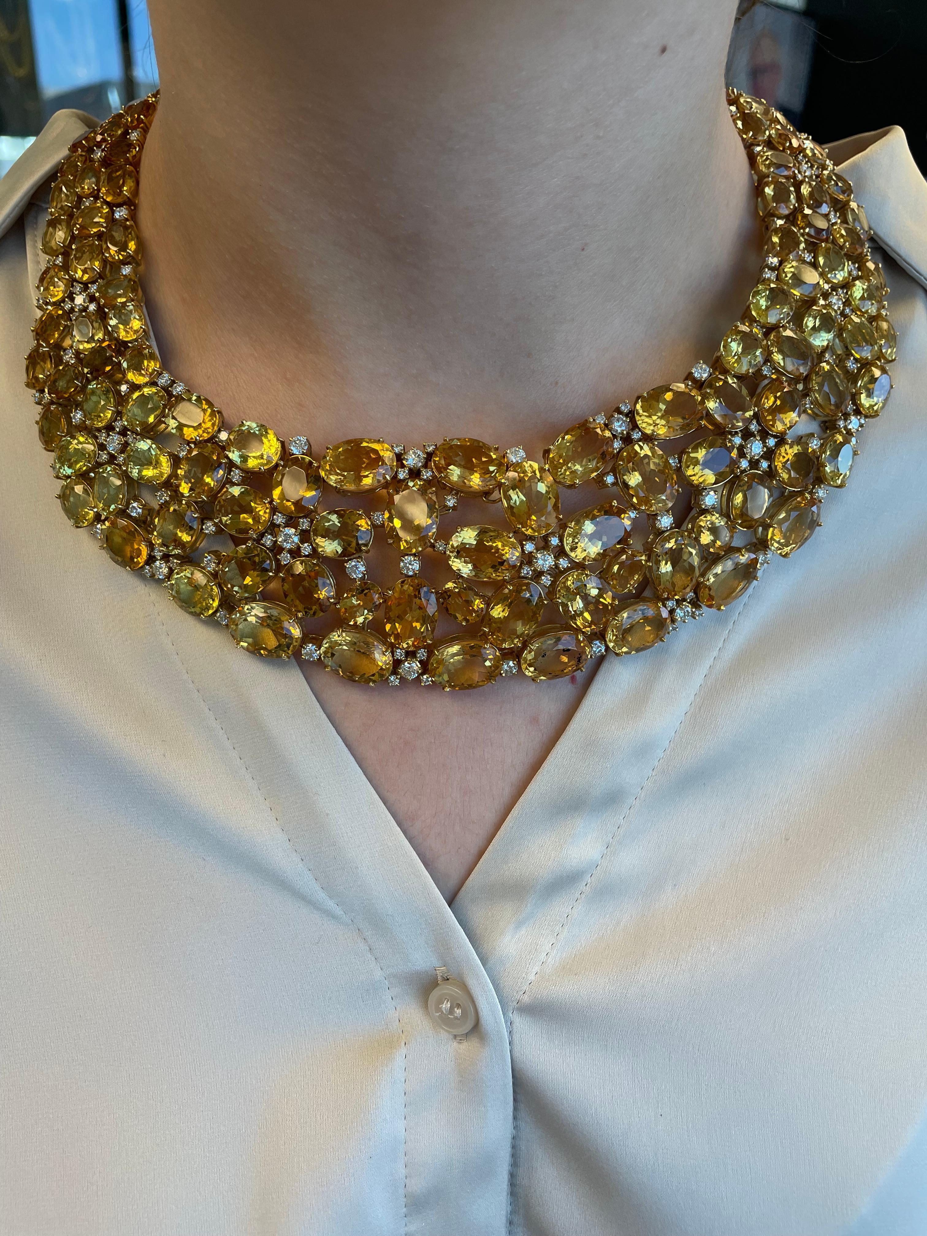 Stunning statement yellow heliodor beryl and diamond grand necklace. 
55.00 carats of oval heliodor beryl. Complimented by 11.83 carats of round brilliant diamonds, approximately G/H color and SI clarity. 18-karat yellow gold.
66.83 carats total