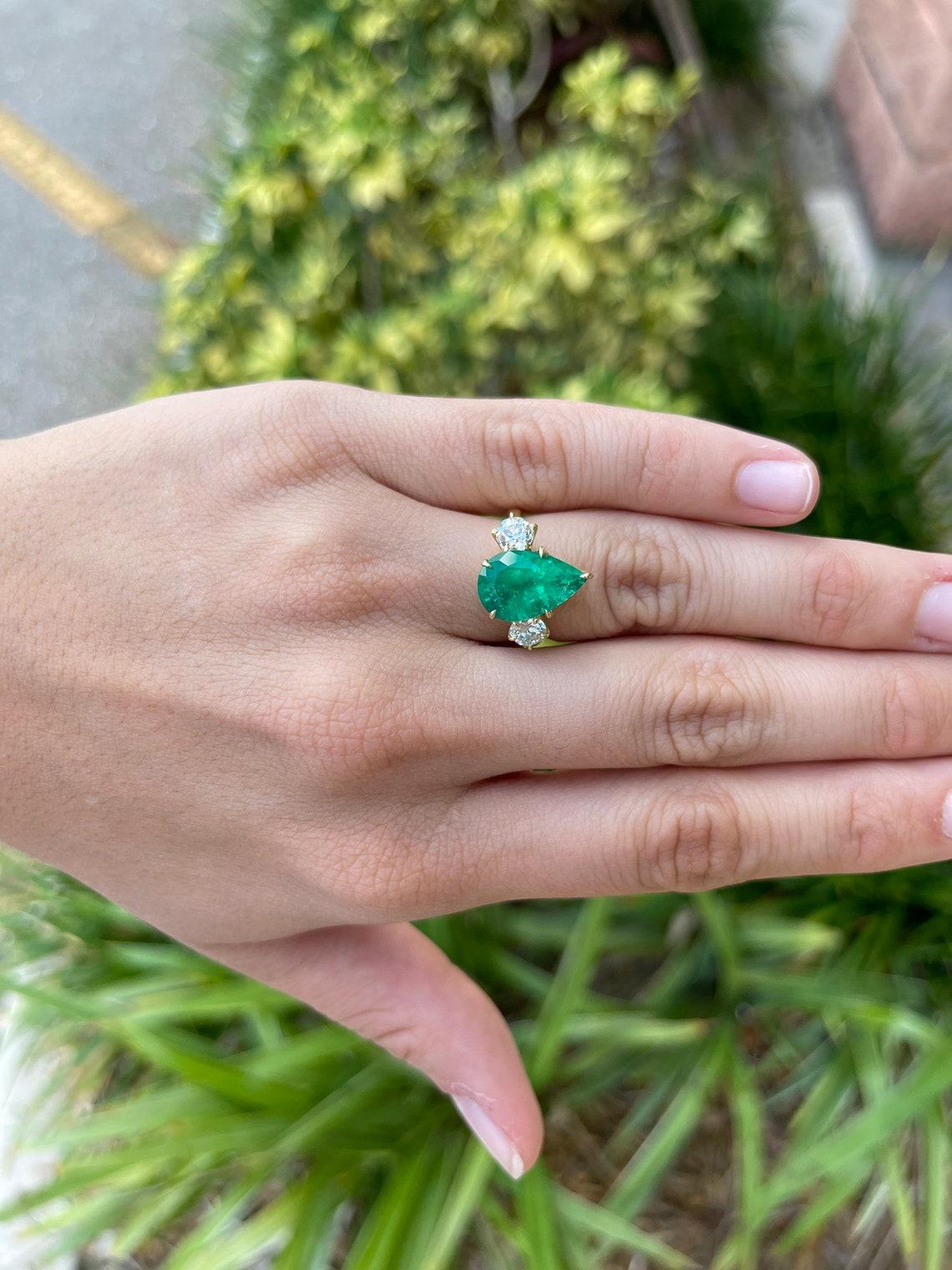 pear and emerald cut diamond ring