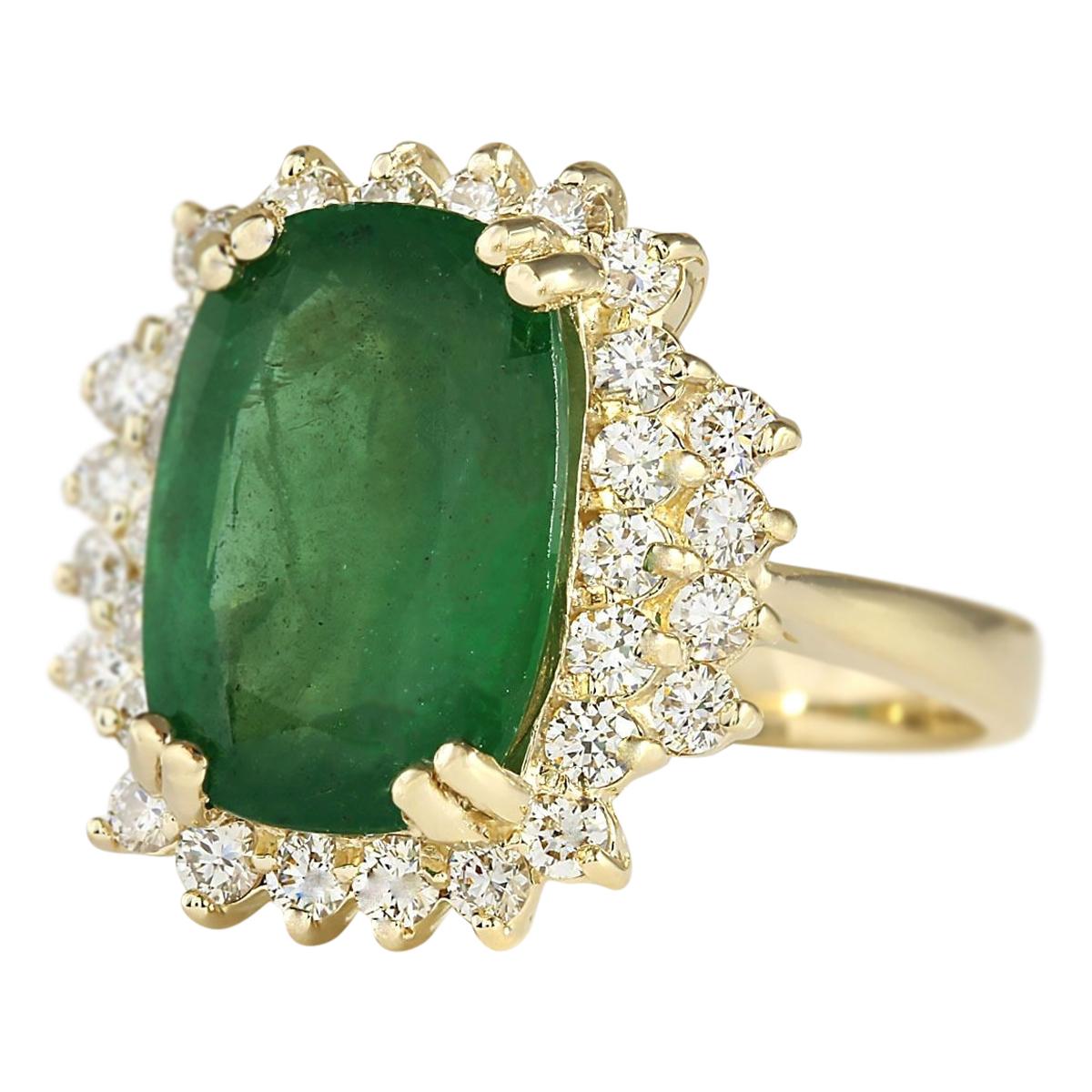 Introducing our exquisite 6.69 Carat Emerald 14 Karat Yellow Gold Diamond Ring. Crafted from stamped 14K Yellow Gold, this ring boasts a total weight of 6.6 grams, ensuring both quality and durability. The centerpiece is a stunning emerald weighing