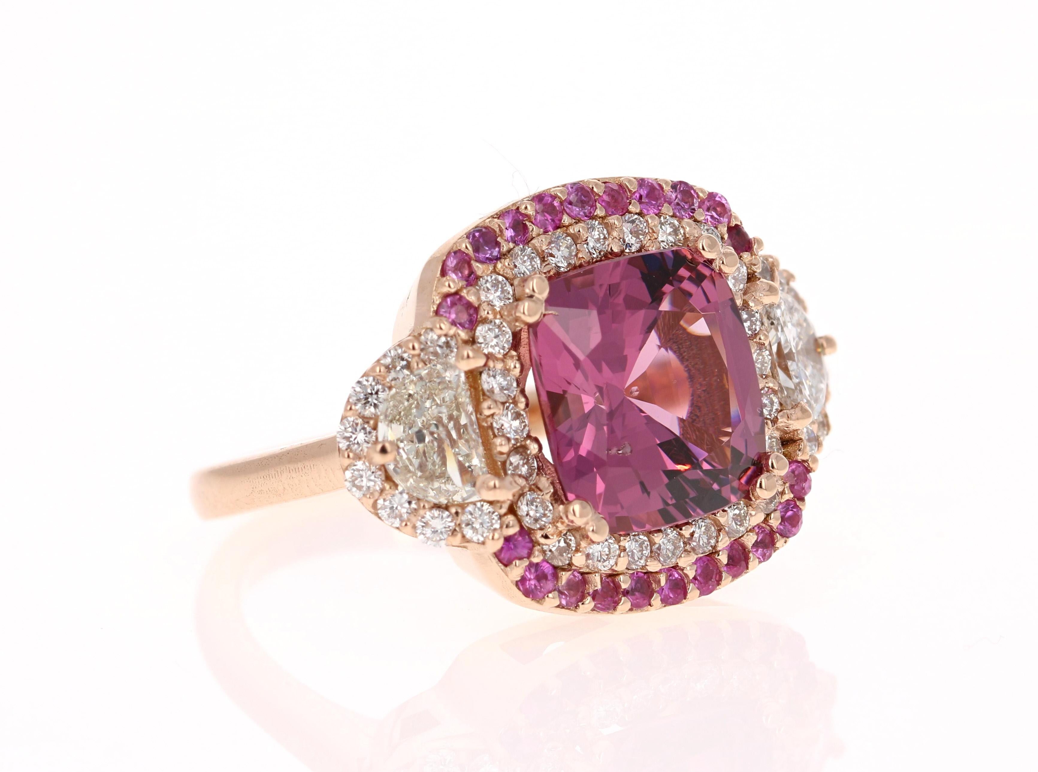 This ring has a stunning Square-Cushion Cut Spinel that weighs 4.95 Carats and has 40 Round Cut Diamonds that weigh 0.59 Carats, along with 2 Half Moon Cut Diamonds that weigh 0.70 Carats. The Clarity and Color of the diamonds are VS2-H. The Spinel