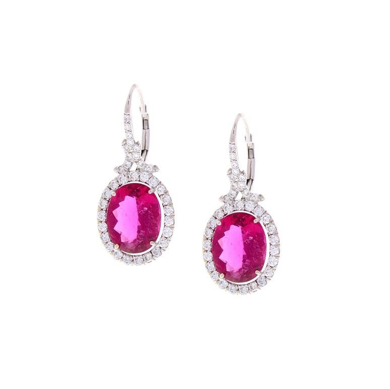If you want to feel like amazing, just slip on this ravishing rubellite and diamond earrings. These earrings feature captivating elements that make them exceptional. Lively 6.69 carat total, bright raspberry-hued rubellite draw your eye immediately