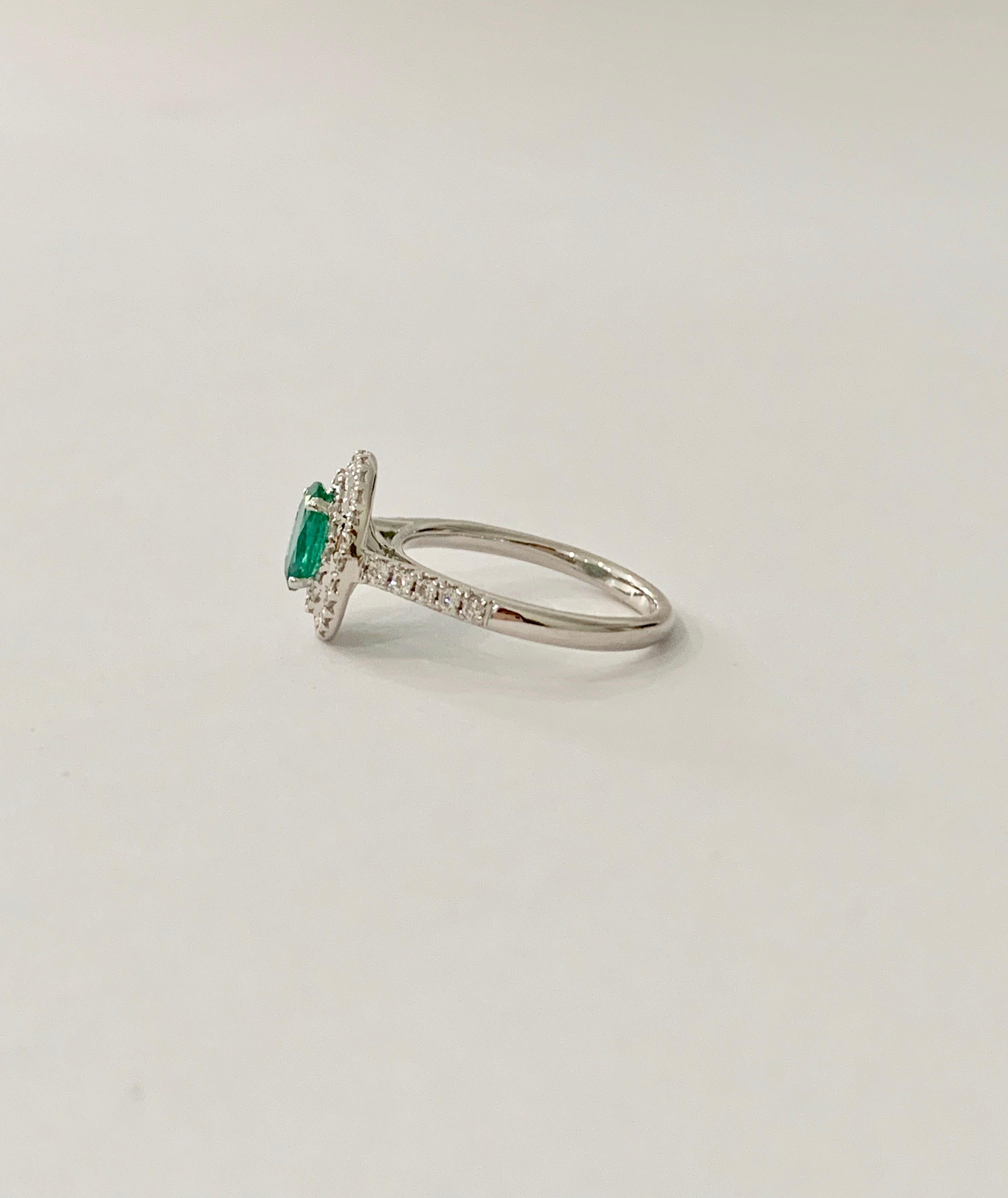 .66 Carat AAAA Oval Emerald Set in Double Diamond Halo Ring in 18ct White Gold In New Condition For Sale In Chislehurst, Kent