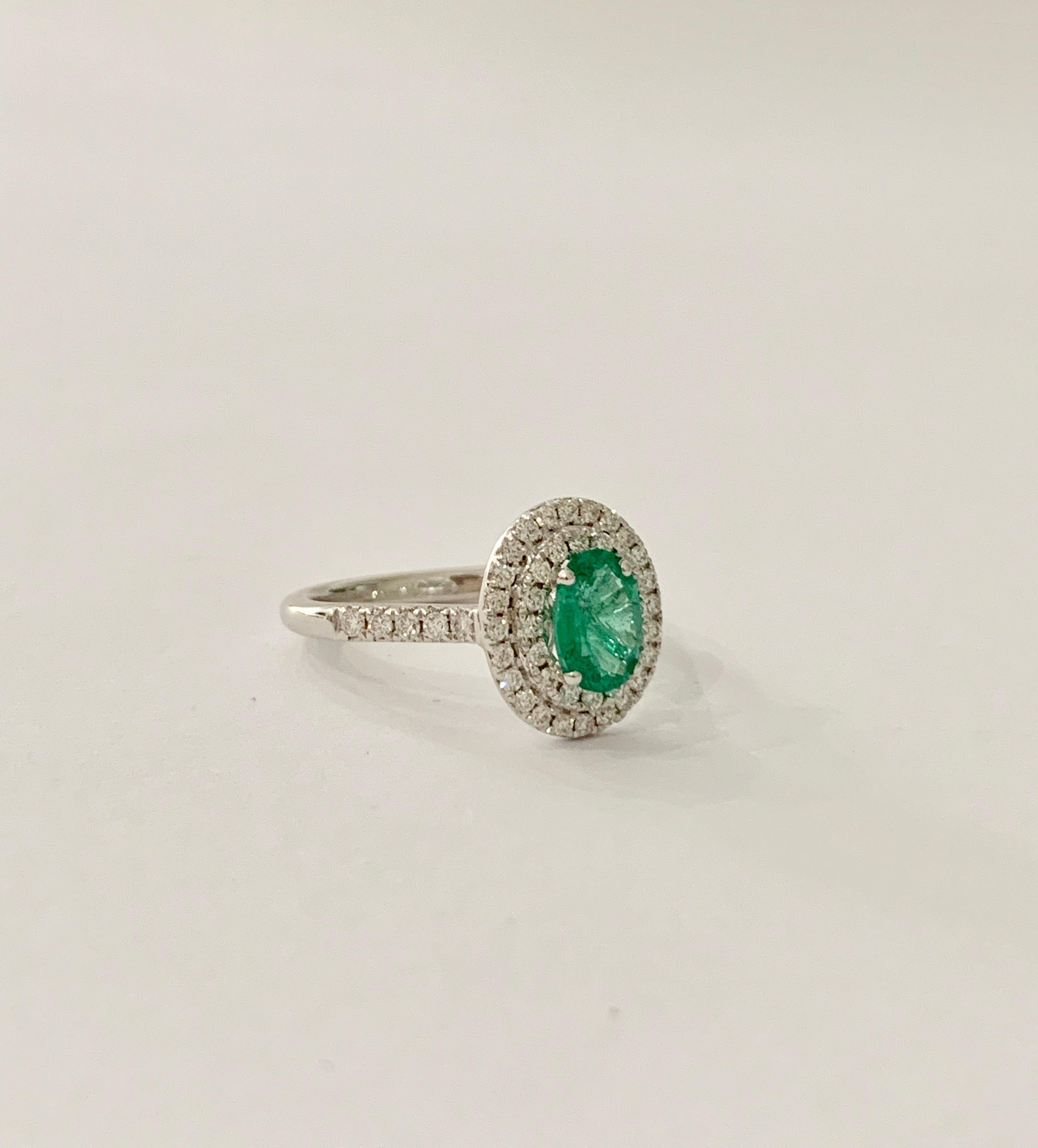 .66 Carat AAAA Oval Emerald Set in Double Diamond Halo Ring in 18ct White Gold For Sale 1