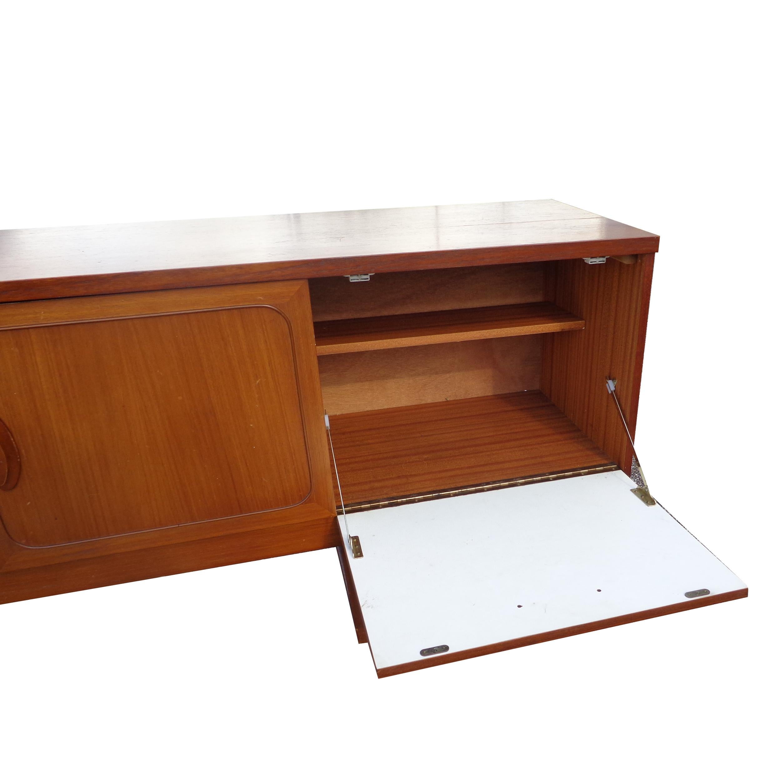 European Mid Century Teak Side Board Credenza with Sleigh Base For Sale