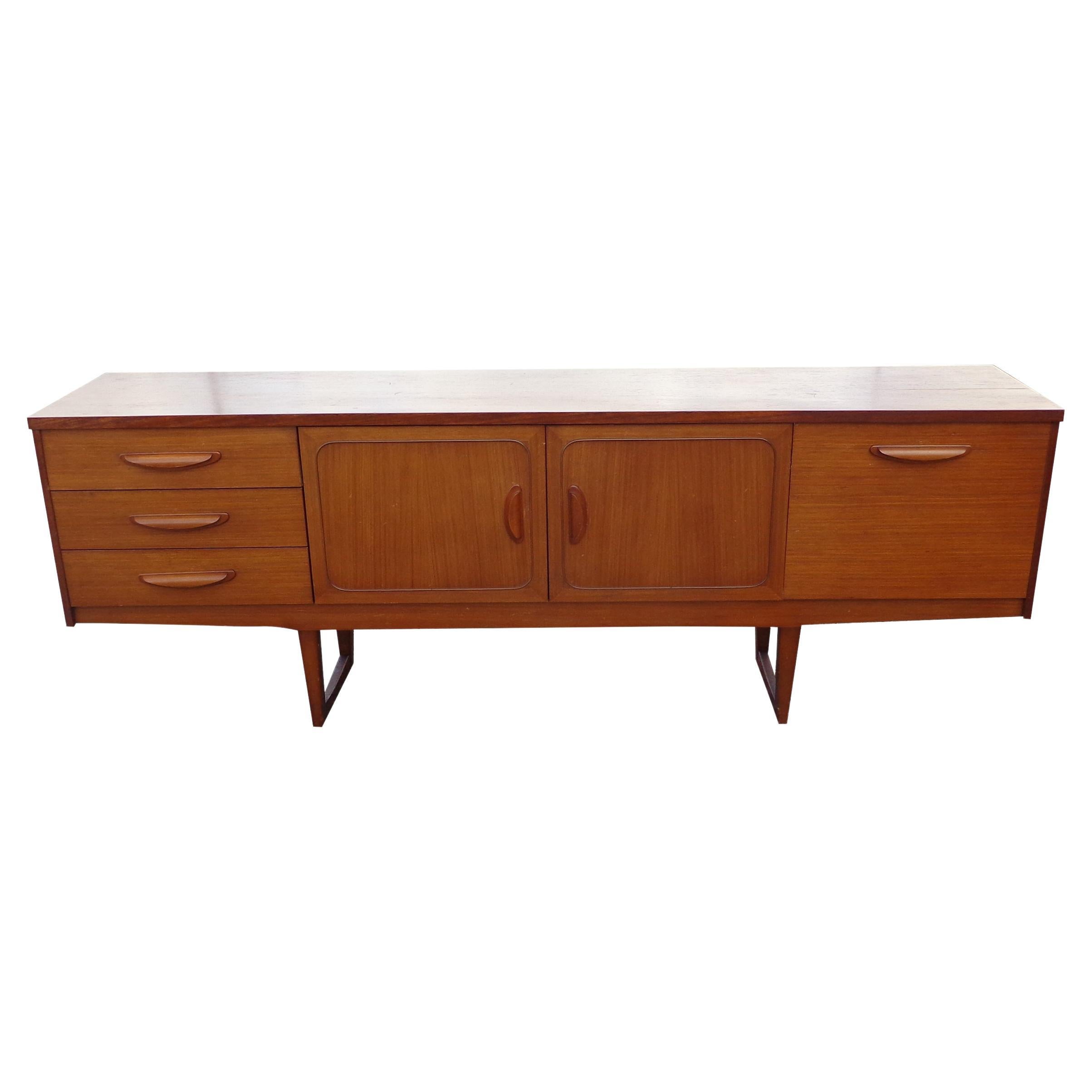 Mid Century Teak Side Board Credenza with Sleigh Base For Sale