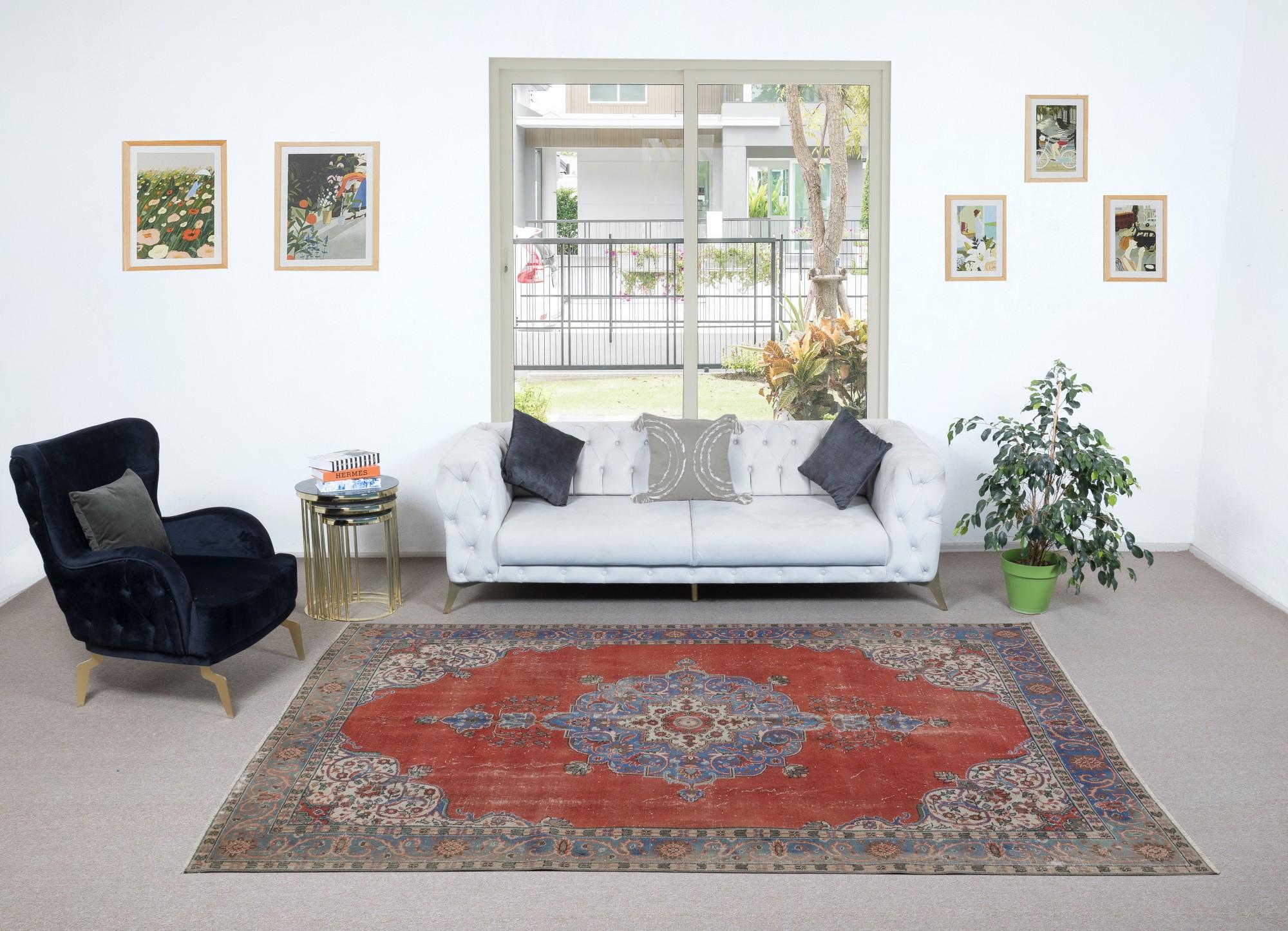 A finely hand-knotted vintage Turkish carpet from 1960s. The rug has even low wool pile on cotton foundation. It is heavy and lays flat on the floor, in very good condition with no issues. It has been washed professionally, The rug is sturdy and can