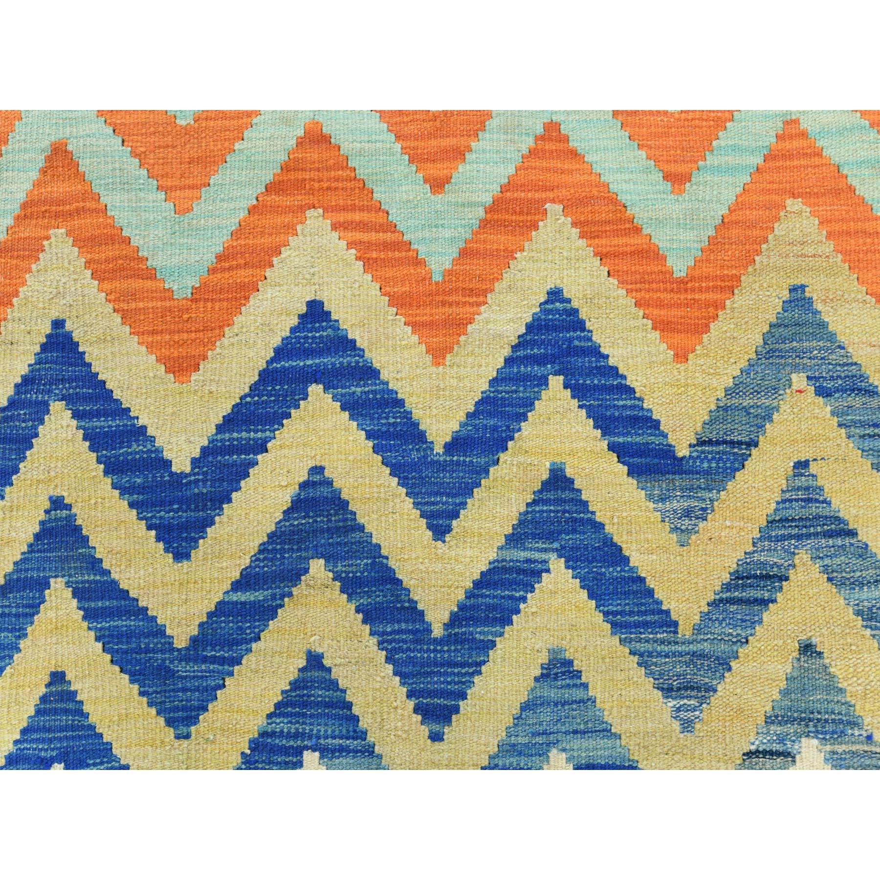 This is a truly genuine one-of-a-kind Colorful, Afghan Kilim with Zig Zag Pattern Flat Weave, Veggie Dyes Organic Wool Hand Woven, Reversible Oriental Rug. It has been Woven for months and months in the centuries-old weaving craftsmanship techniques
