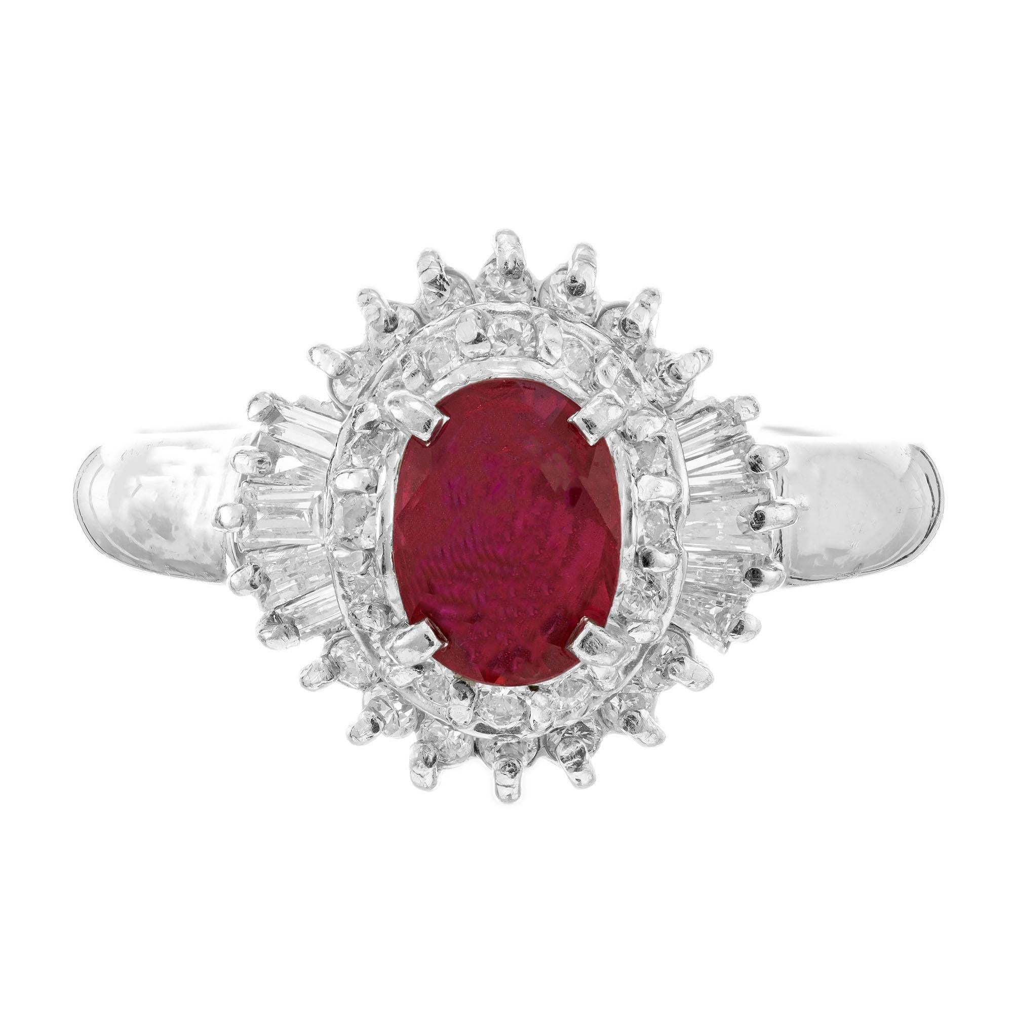 Oval ruby and diamond halo engagement ring. GIA certified .67 carat natural corundum oval center ruby with a halo of baguette and around diamonds in a custom-made platinum setting. 

1 oval red ruby, SI approx. .67cts GIA Certificate #6217312015
10