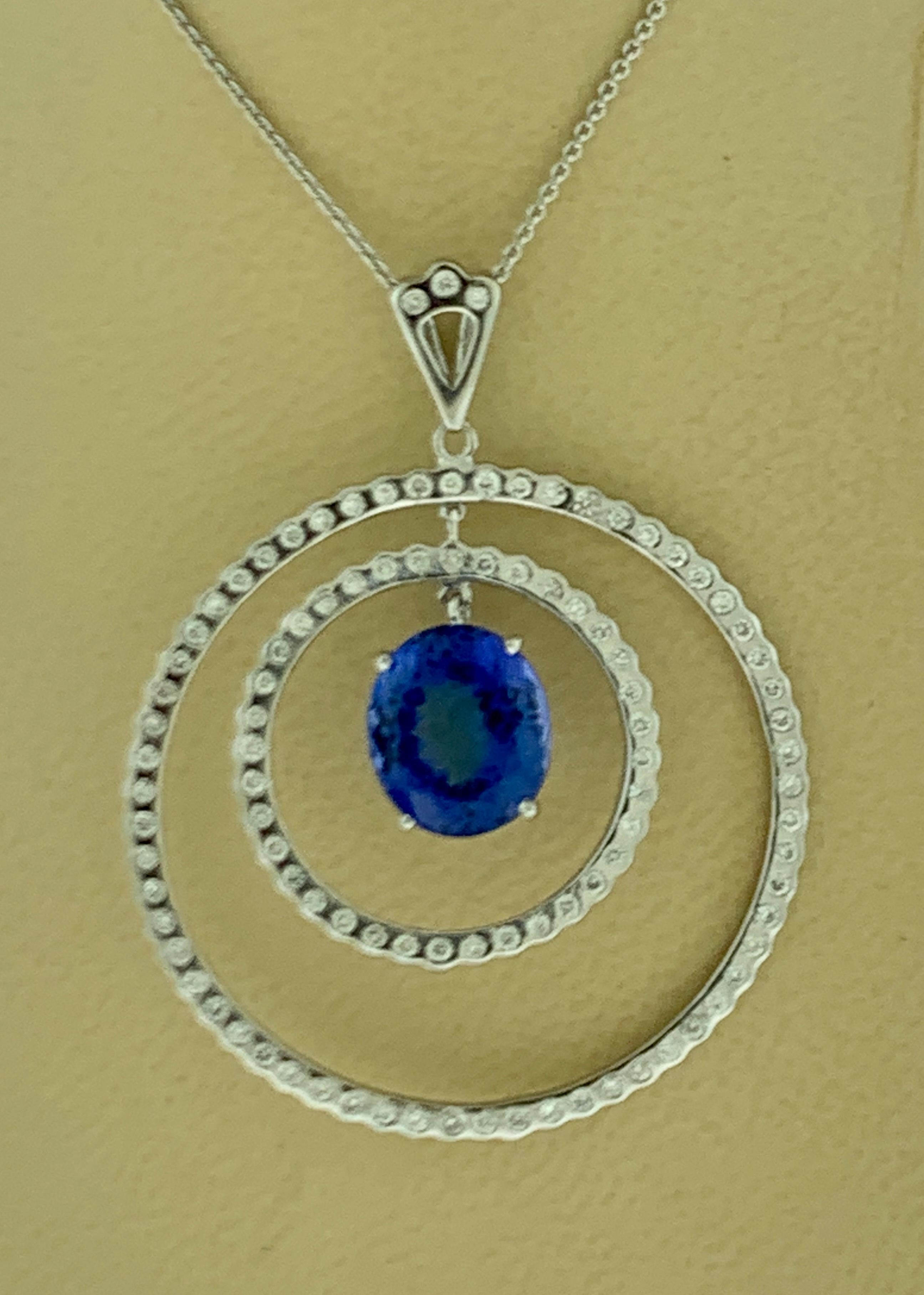 6.7 Carat Tanzanite & 2.5 Ct Diamond Two Circles Pendant/ Necklace 18 Karat Gold For Sale 3