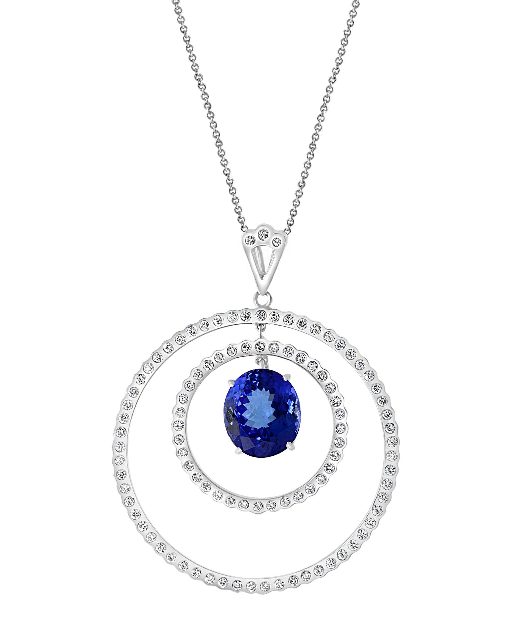 6.7 Ct Tanzanite & 2.5 Ct Diamond Two Circles Pendant/ Necklace 18 K White Gold
Tanzanite Weight  approximately 6.7  Carats
Diamond Weight  approximately 2.5 Carats
Tanzanite is extremely fine quality and color, AAA grade of Tanzanite with beautiful