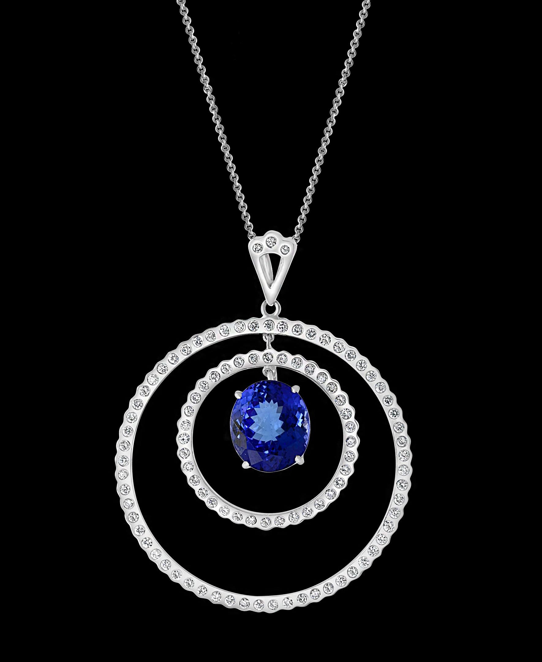 Oval Cut 6.7 Carat Tanzanite & 2.5 Ct Diamond Two Circles Pendant/ Necklace 18 Karat Gold For Sale