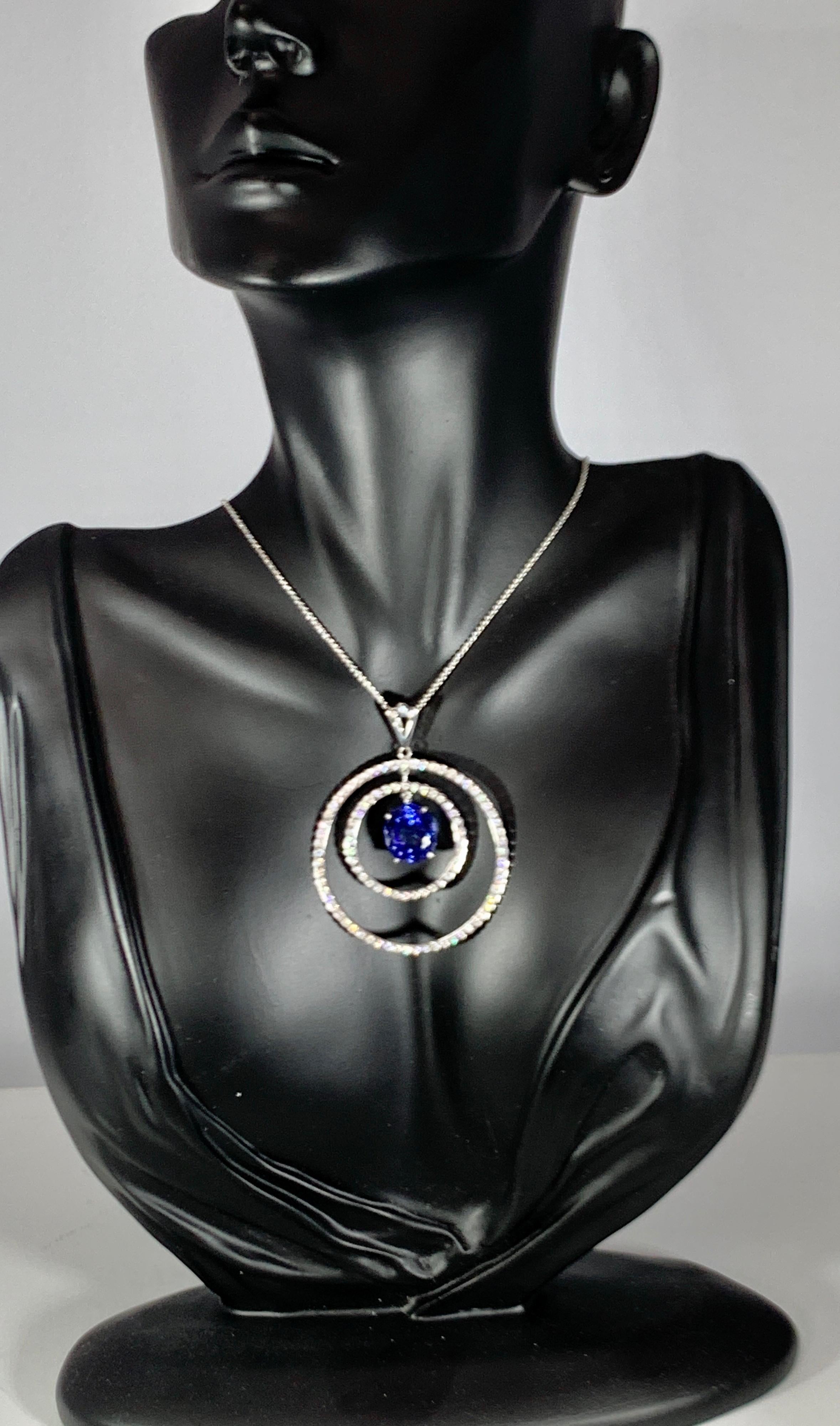 Women's 6.7 Carat Tanzanite & 2.5 Ct Diamond Two Circles Pendant/ Necklace 18 Karat Gold For Sale