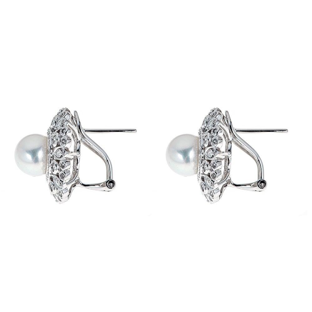 6.7 TCW Cultured Pearl Diamond Diamond Stud Earrings in 14k White Gold

Flashing with brilliance, these cultured pearls and diamonds are a classic accent to your style. Featuring almost 1/2 TCW of round diamonds are hugging pearls, creating a