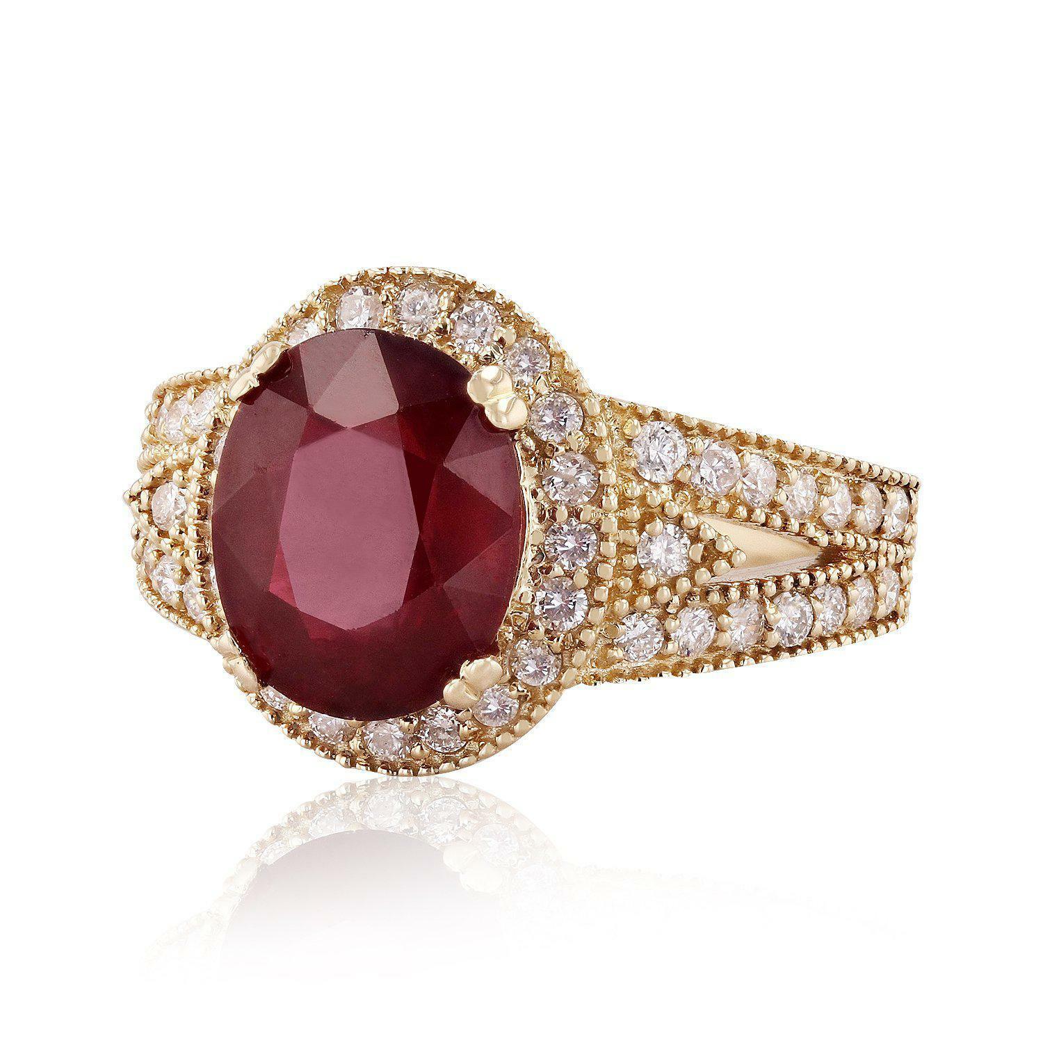 6.70 Carats Impressive Red Ruby and Natural Diamond 14K Yellow Gold Ring

Total Red Ruby Weight is Approx. 5.50 Carats

Ruby Treatment: Lead Glass Filling

Ruby Measures: Approx. 11.00 x 9.00mm

Natural Round Diamonds Weight: Approx. 1.20 Carats
