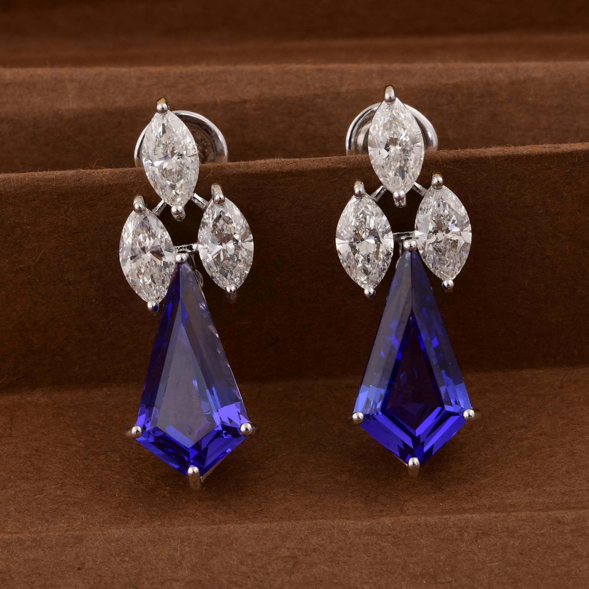Cast from 18-karat gold, these exquisite earrings are handset with 6.70 carats tanzanite gemstone and 3.00 carats of sparkling diamonds.

FOLLOW SPECTRUM JEWELS storefront to view the latest collection & exclusive pieces. Spectrum Jewels is proudly