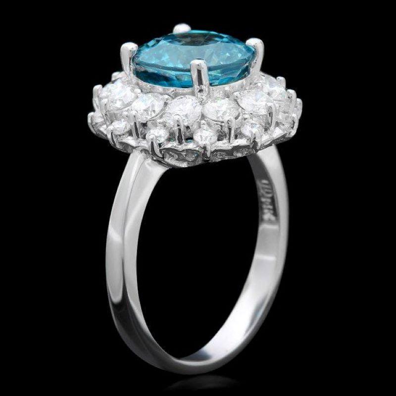 6.70 Carats Natural Blue Zircon and Diamond 14K Solid White Gold Ring

Total Natural Blue Zircon Weight is: Approx. 5.40 Carats 

Zircon Measures: Approx. 9.00mm

Natural Round Diamonds Weight: Approx.  1.30 Carats (color G-H / Clarity