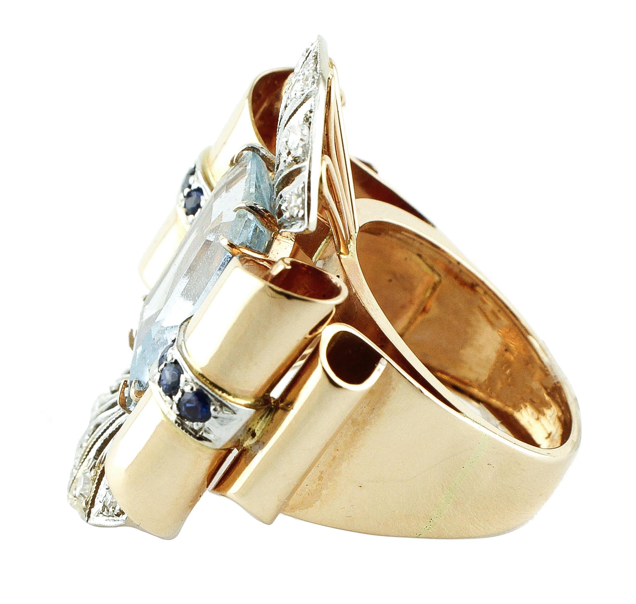 Fashion design ring (bow shape) in 14K rose and white gold composed of 6.70 ct of aquamarine, adorned on the two sides by 0.50 ct of blue sapphire and finally at the top and at the end, it is studded by 0.30 ct little white diamonds.
Diamonds 0.30