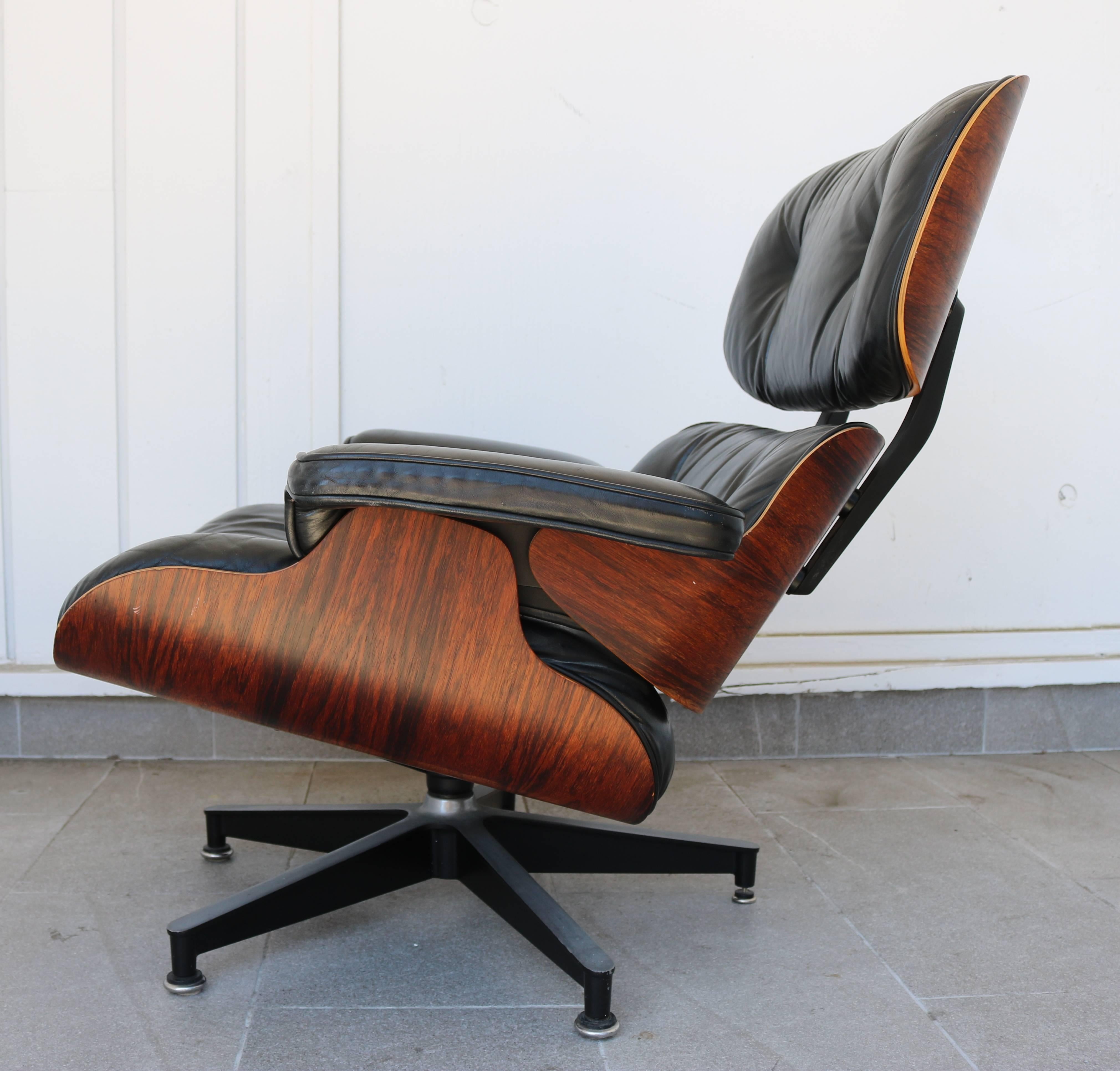 This five-legged chair is made of molded plywood and leather, designed by Charles and Ray Eames for the Herman Miller furniture company in 1956. It is officially titled Eames Lounge 670 and was released in 1956 after years of development by