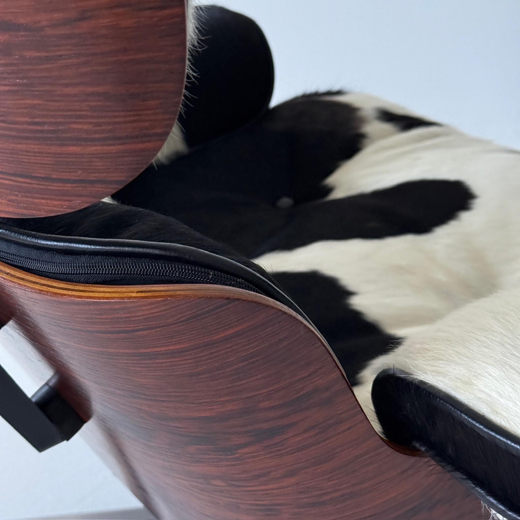 Cuir 670 Lounge Chair en peau de vache par Charles and Ray Eames pour Herman Miller en vente