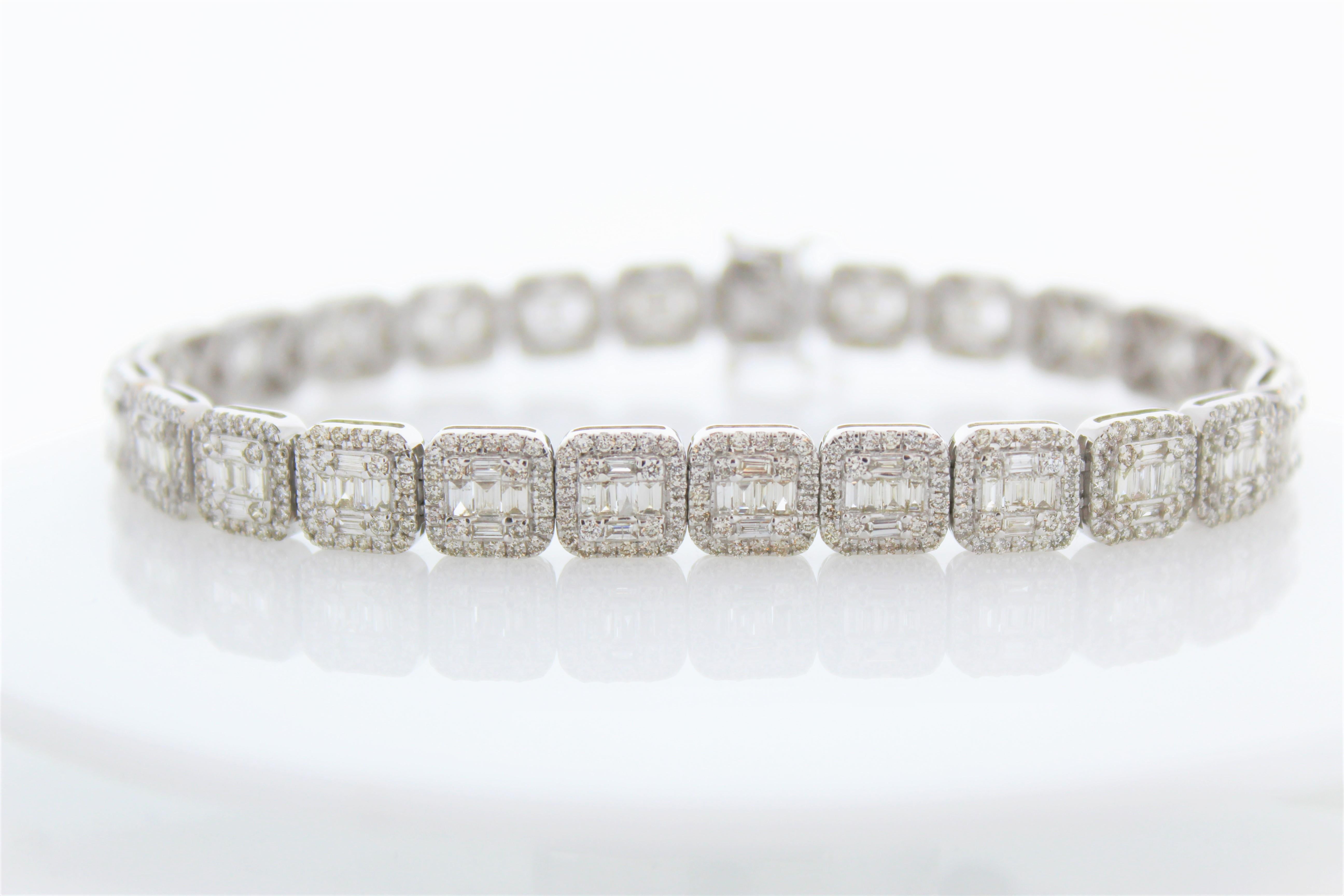 This diamond bracelet features 6.70 carats made up of 6.70 perfectly natural diamonds. They are matched in size, color, and luster. Created in 14K white gold, this beautiful fancy diamond bracelet closes securely. It's elegant on its own or perfect