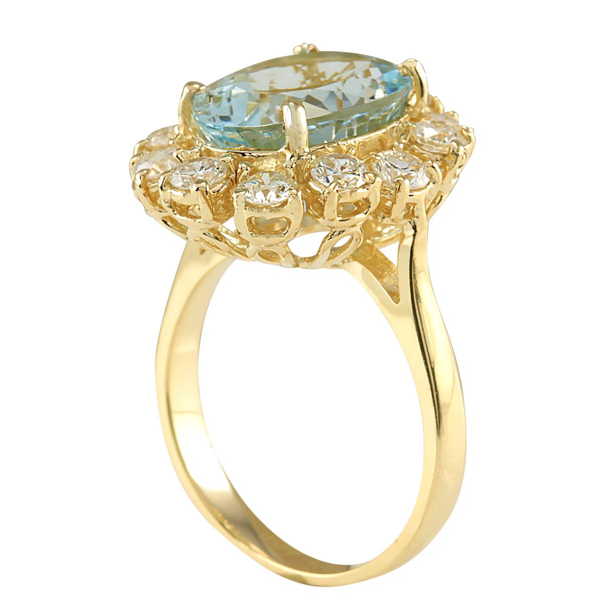 Modern Aquamarine Diamond Ring In 14 Karat Yellow Gold  For Sale