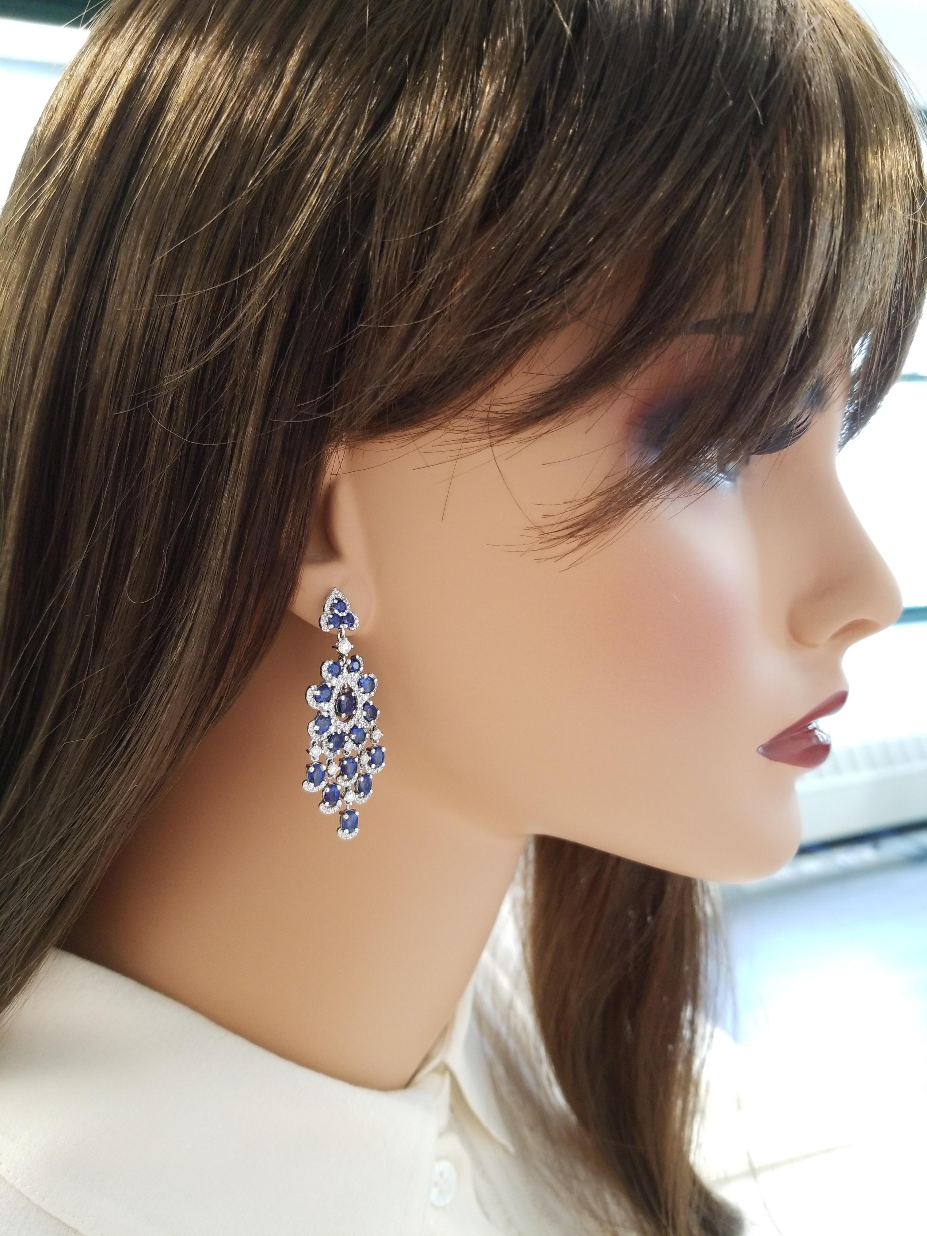 If you are looking for top-end gem chandelier earrings, your search is over. These earrings are fine and delicate. 36 oval blue sapphires adorn these earrings totaling 6.71 carats. The gem source is Thailand; perfectly matched and calibrated, the