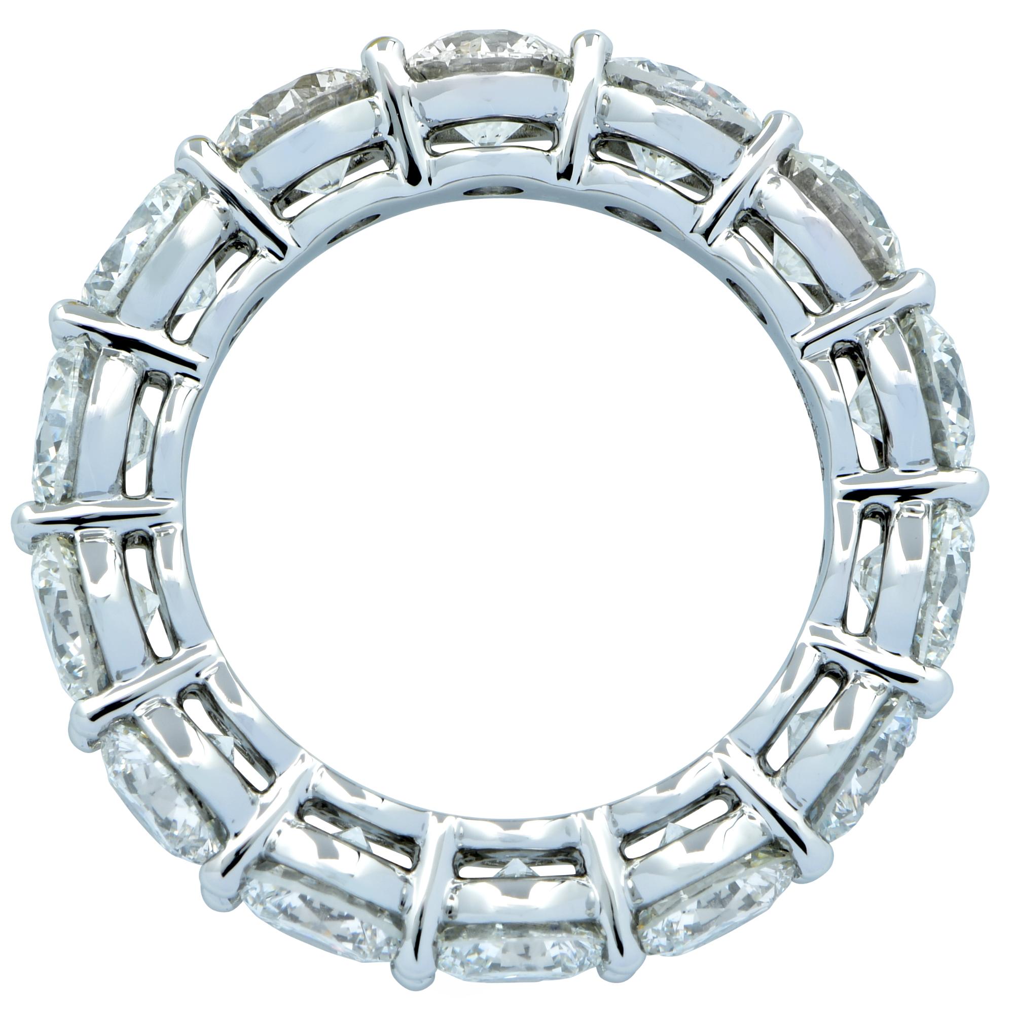Platinum Diamond Eternity band featuring 14 round brilliant cut diamonds weighing 6.71cts F-G color and VS clarity. Finger size 6

Our pieces are all accompanied by an appraisal performed by one of our in-house GIA Graduates. They are also