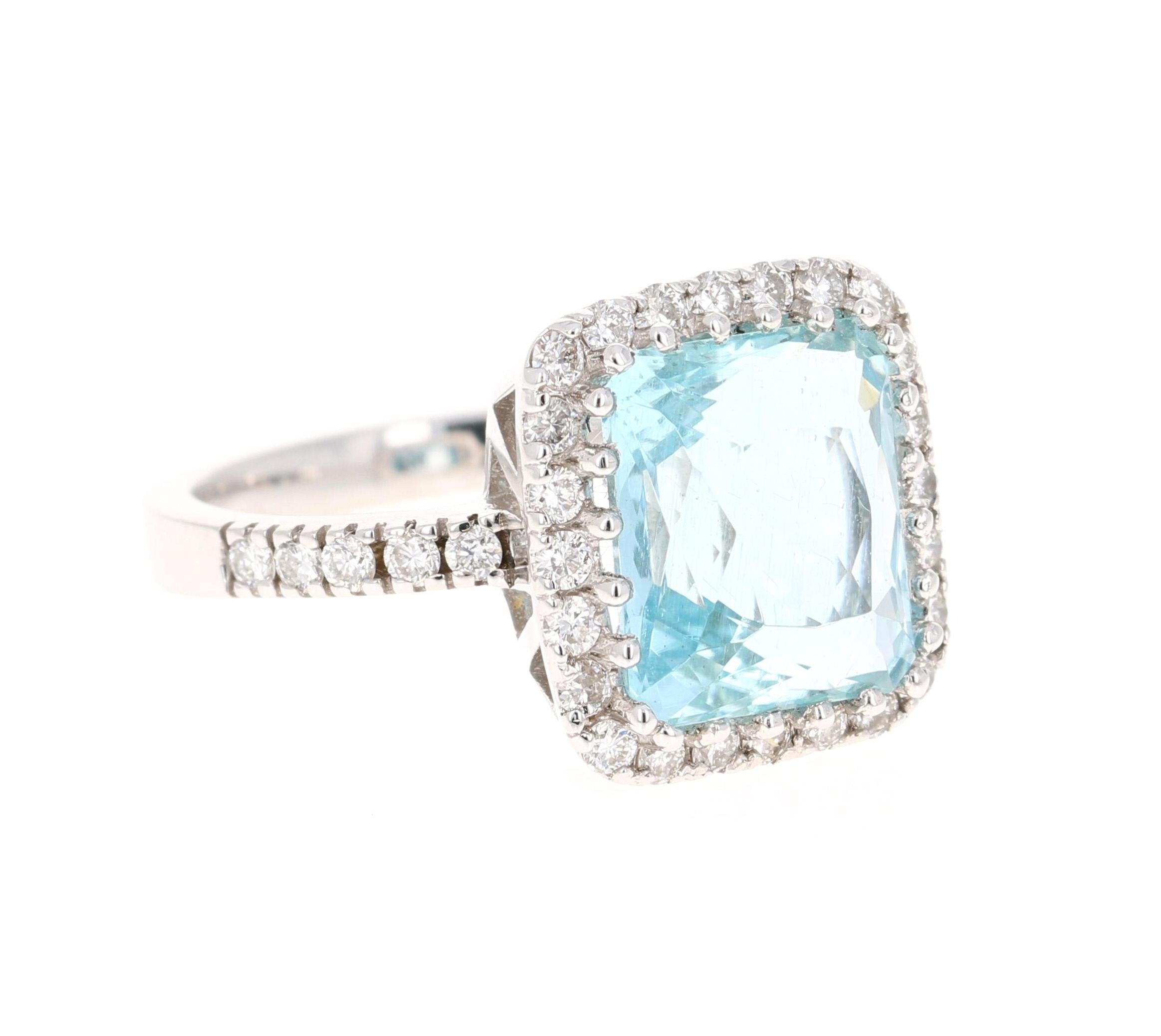 This ring has a 5.98 Carat gorgeous Aquamarine and is surrounded by 34 Round Brilliant Cut Diamonds that weigh 0.74 Carats. The Clarity of the Diamonds is a VS and the Color is F.  The total carat weight of the ring is 6.72 Carats.

The ring is