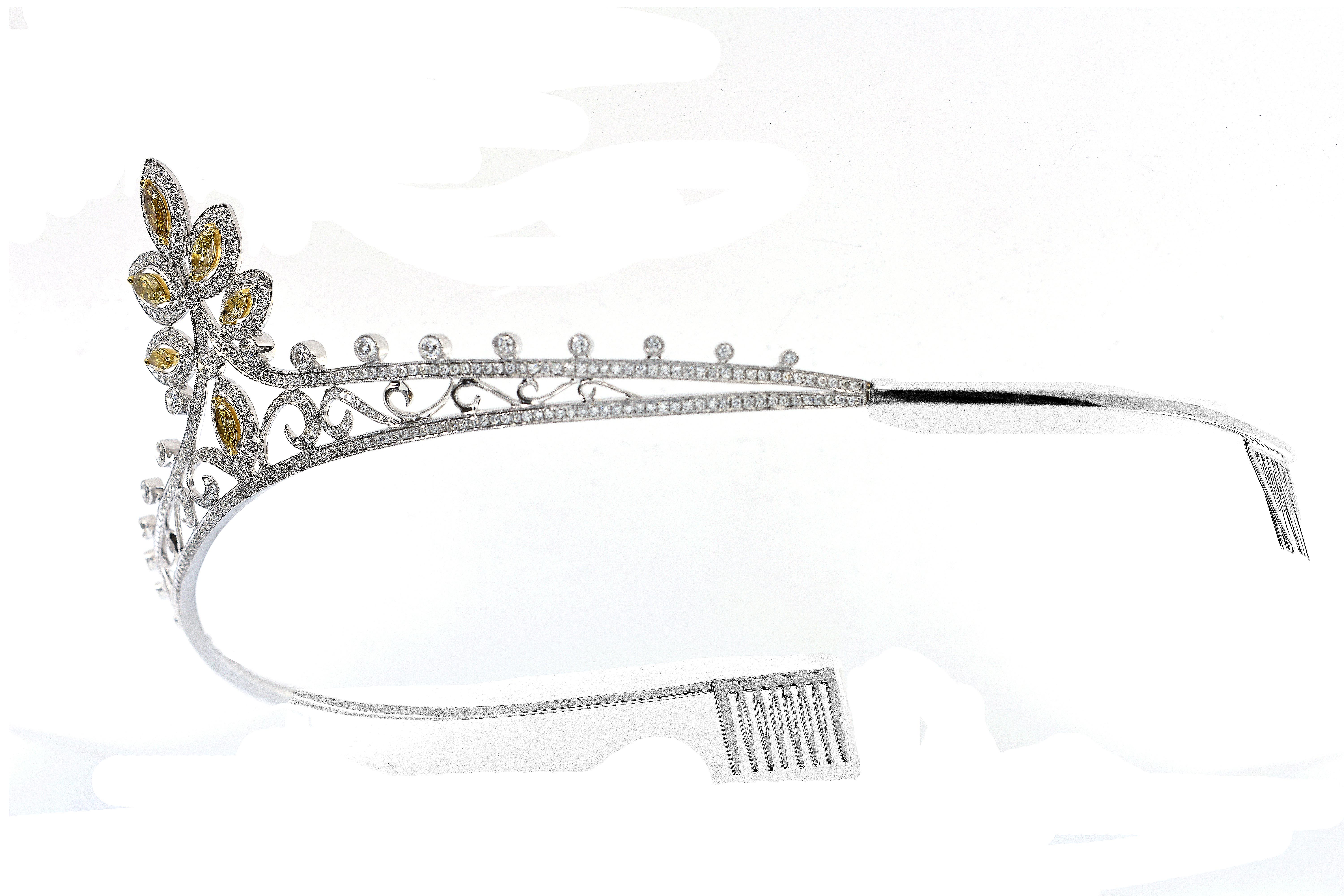 Our 6.72 Carat Fancy Yellow Marquise Cut Diamond And White Diamond Tiara made by Shimon's Creations will make you feel like a princess as you wear it. Every diamond in this exceptional royal looking tiara is developed to achieve a natural beauty of