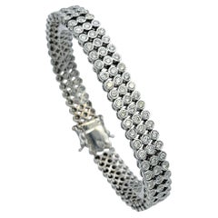 6.72 Carats Total Three Row Bezel Set Diamond Bracelet in 18 Karat White Gold