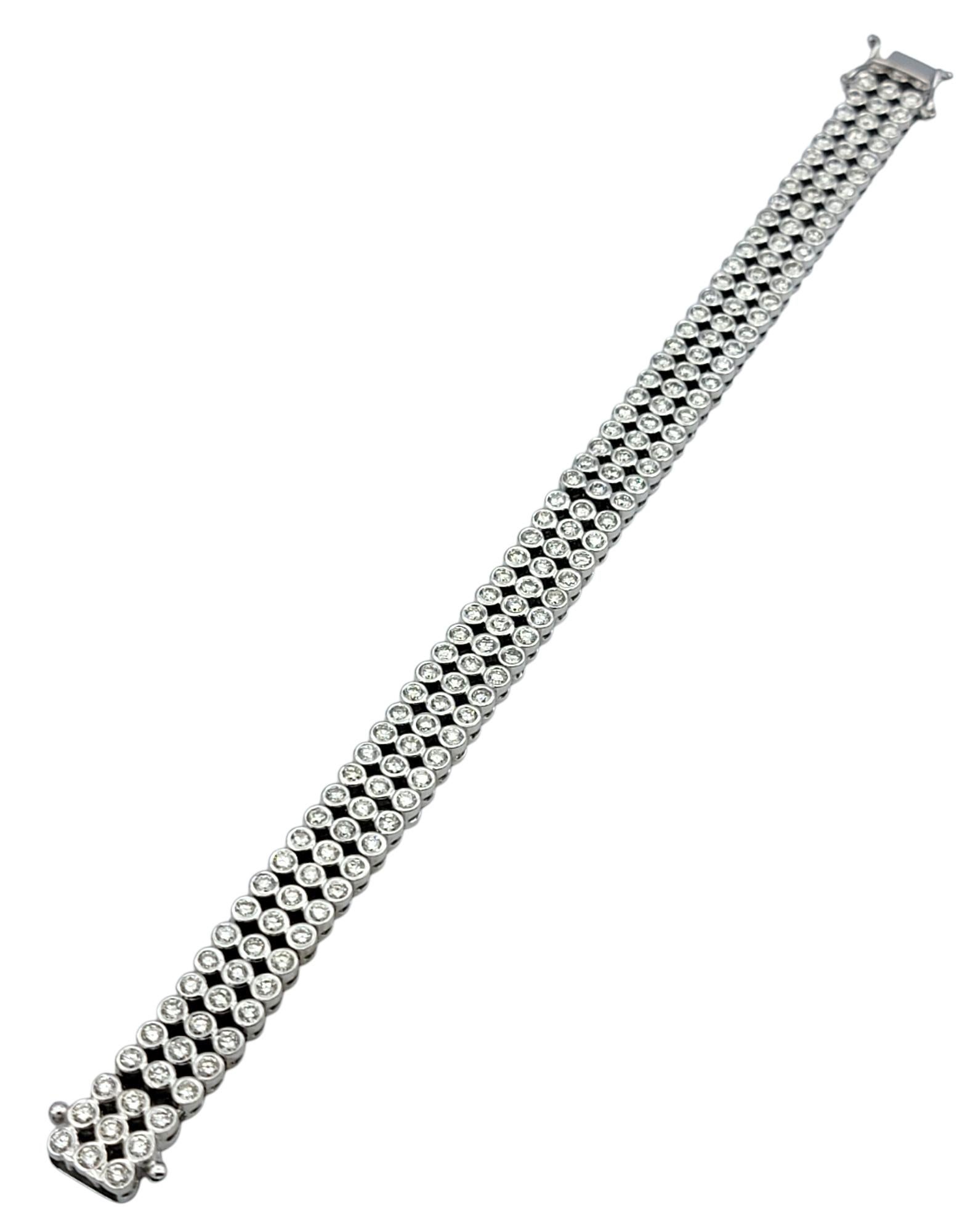 Contemporary 6.72 Carat Triple Row Bezel Set Round Diamond Bracelet in 18 Karat White Gold For Sale