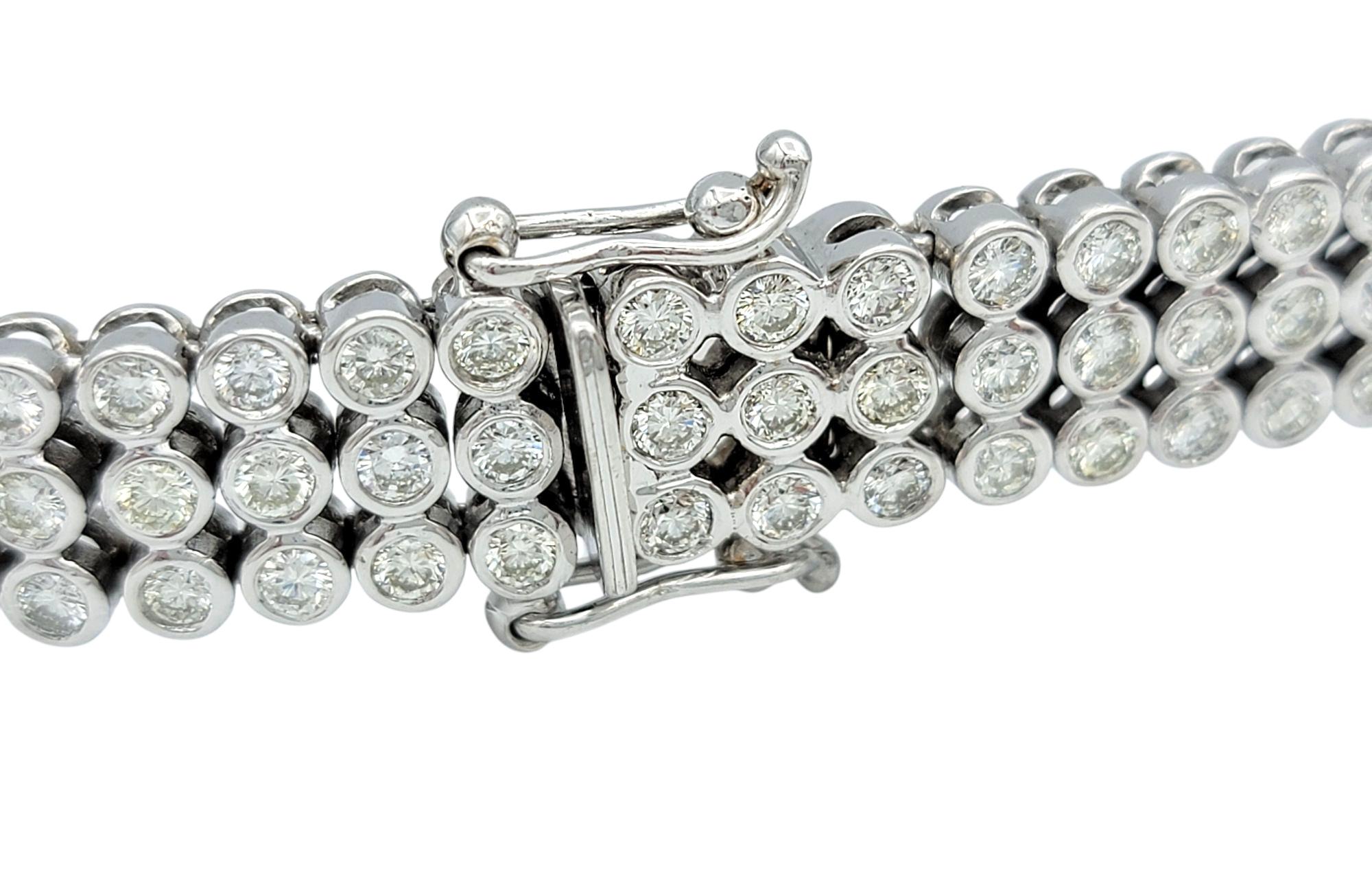Round Cut 6.72 Carat Triple Row Bezel Set Round Diamond Bracelet in 18 Karat White Gold For Sale