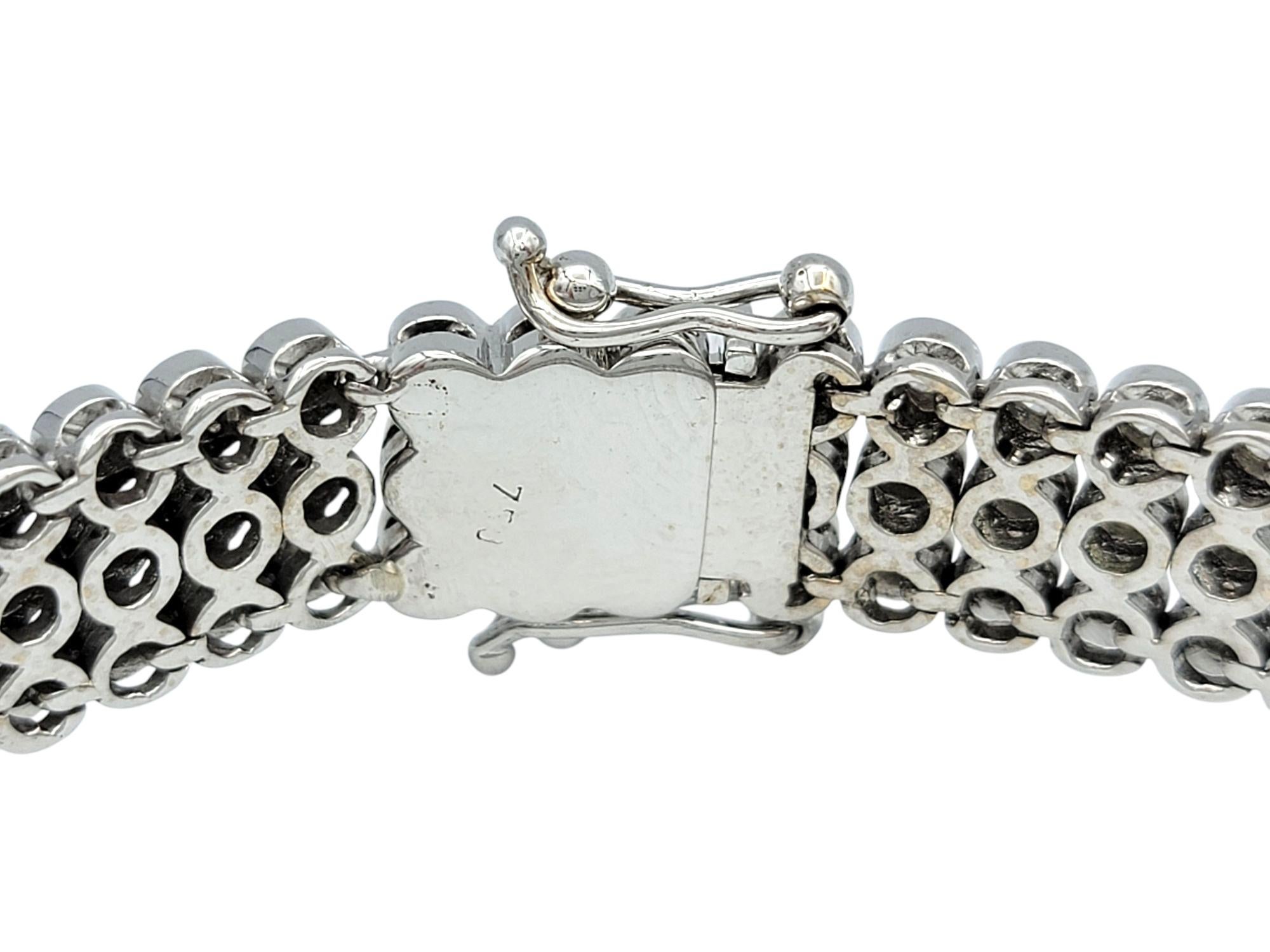 Women's 6.72 Carat Triple Row Bezel Set Round Diamond Bracelet in 18 Karat White Gold For Sale
