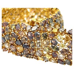 Bracelet tennis large avec diamants de couleur fantaisie de 67,24 carats