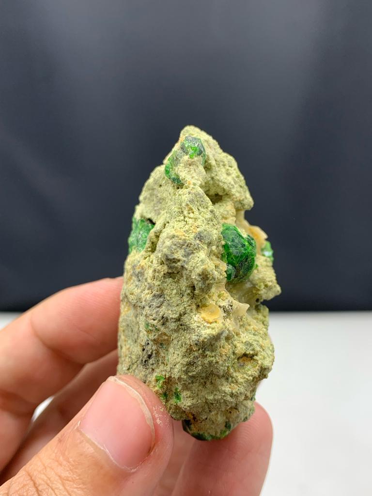67.25 Gram Pretty Demantoid Garnet Specimen From Pakistan 

Weight: 67.25 Gram 
Dimension: 5.6 x 4.1 x 3.1 Cm
Origin: Balochistan, Pakistan

Demantoid is the green gemstone variety of the mineral andradite, a member of the garnet group of Minerals.