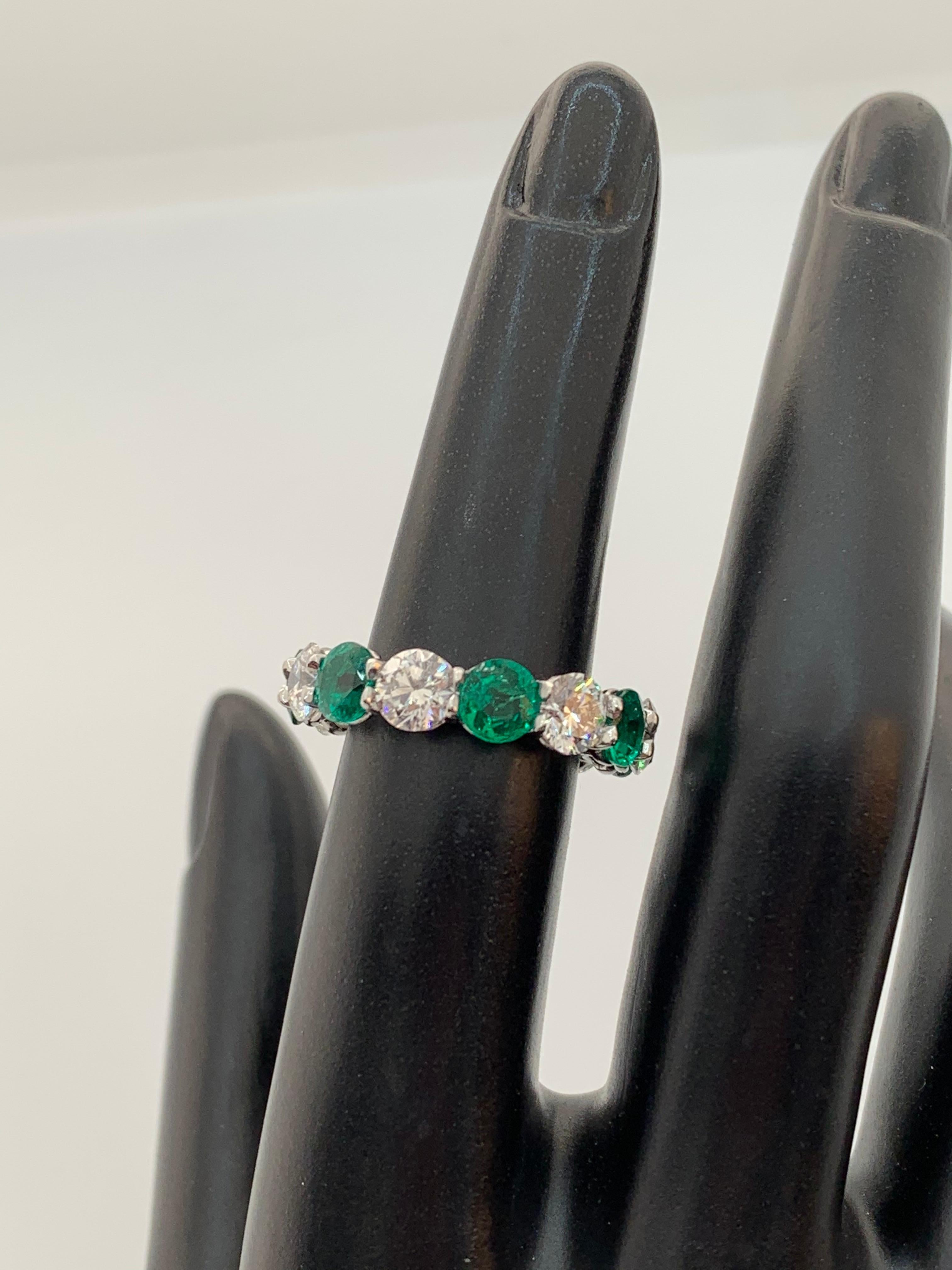 Round Cut 6.73 Carat Emerald and Round Diamond Eternity Band Ring For Sale