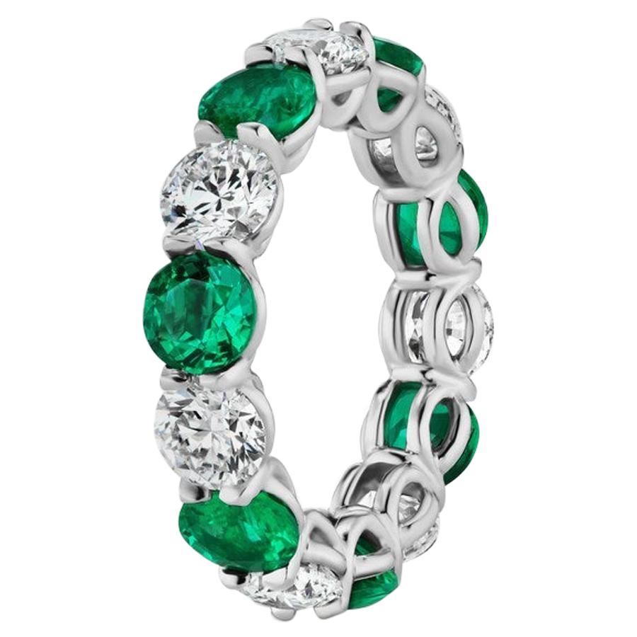 6.73 Carat Emerald and Round Diamond Eternity Band Ring