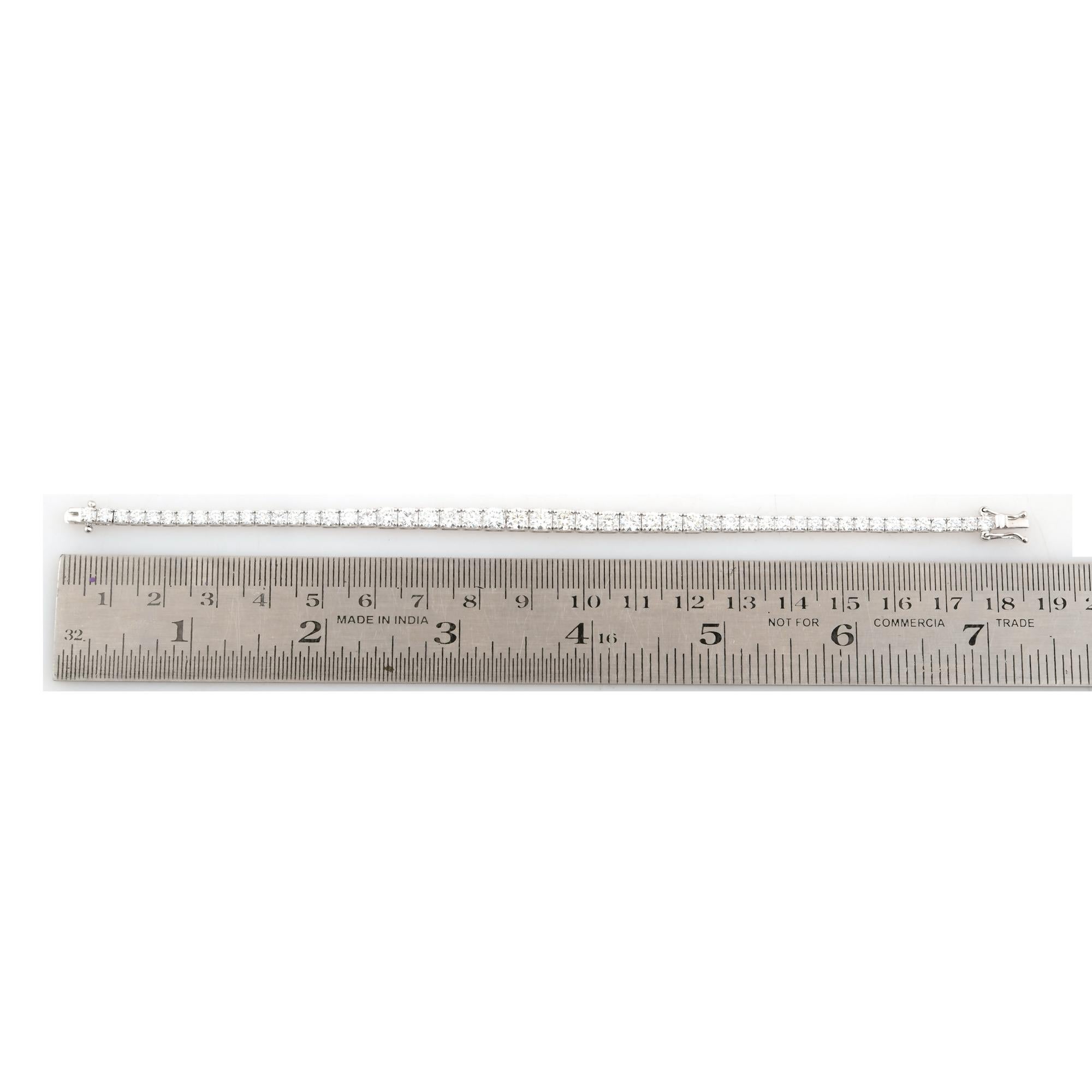 Round Cut 6.73 Carat SI Clarity HI Color Graduated Diamond Bracelet 18 karat White Gold For Sale