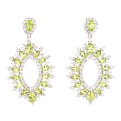 6.boucles d'oreilles en argent avec péridot de 74 carats et topaze blanche