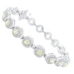 6.74 Carat Total Cushion Cut Fancy Yellow Diamond Bracelet in 18 Karat Gold