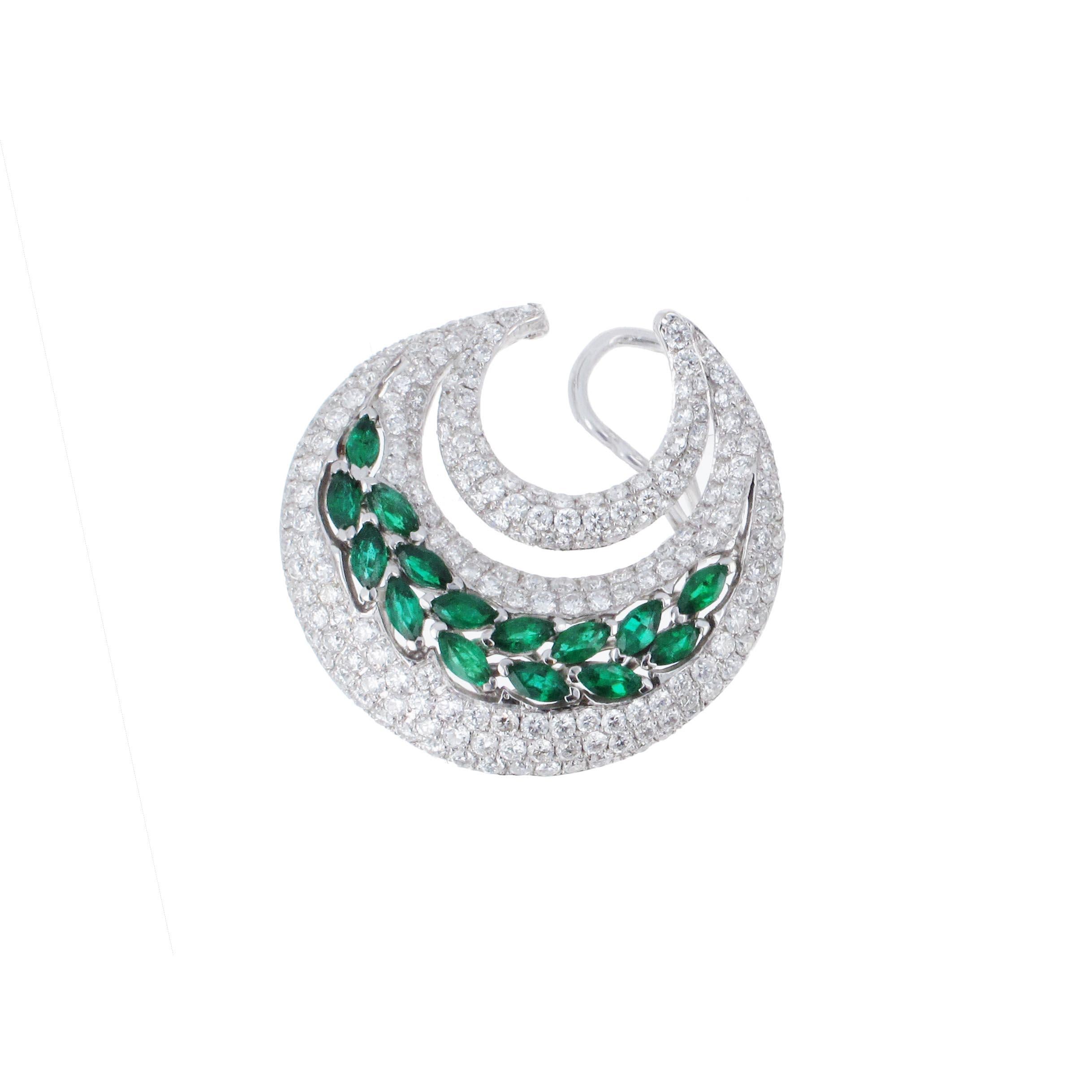C shape circle stud hoop earrings beautifully made with emerald and diamonds. These stylish earrings have 30 mixed shape emeralds weighing 1.93 carats total and 4.81 carats of round brilliant G/H color VS/SI clarity diamonds. The earrings are made
