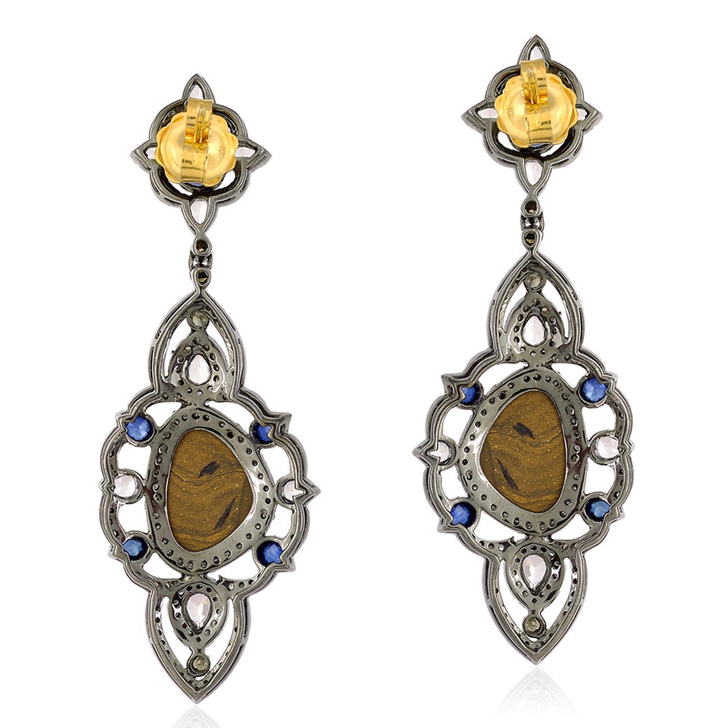 Handcrafted from 18-karat gold and sterling silver, these beautiful drop earrings are set with 6.75 carats Opal doublets, 5.55 carats sapphire and 2.78 carats of glimmering diamonds. 

FOLLOW  MEGHNA JEWELS storefront to view the latest collection &