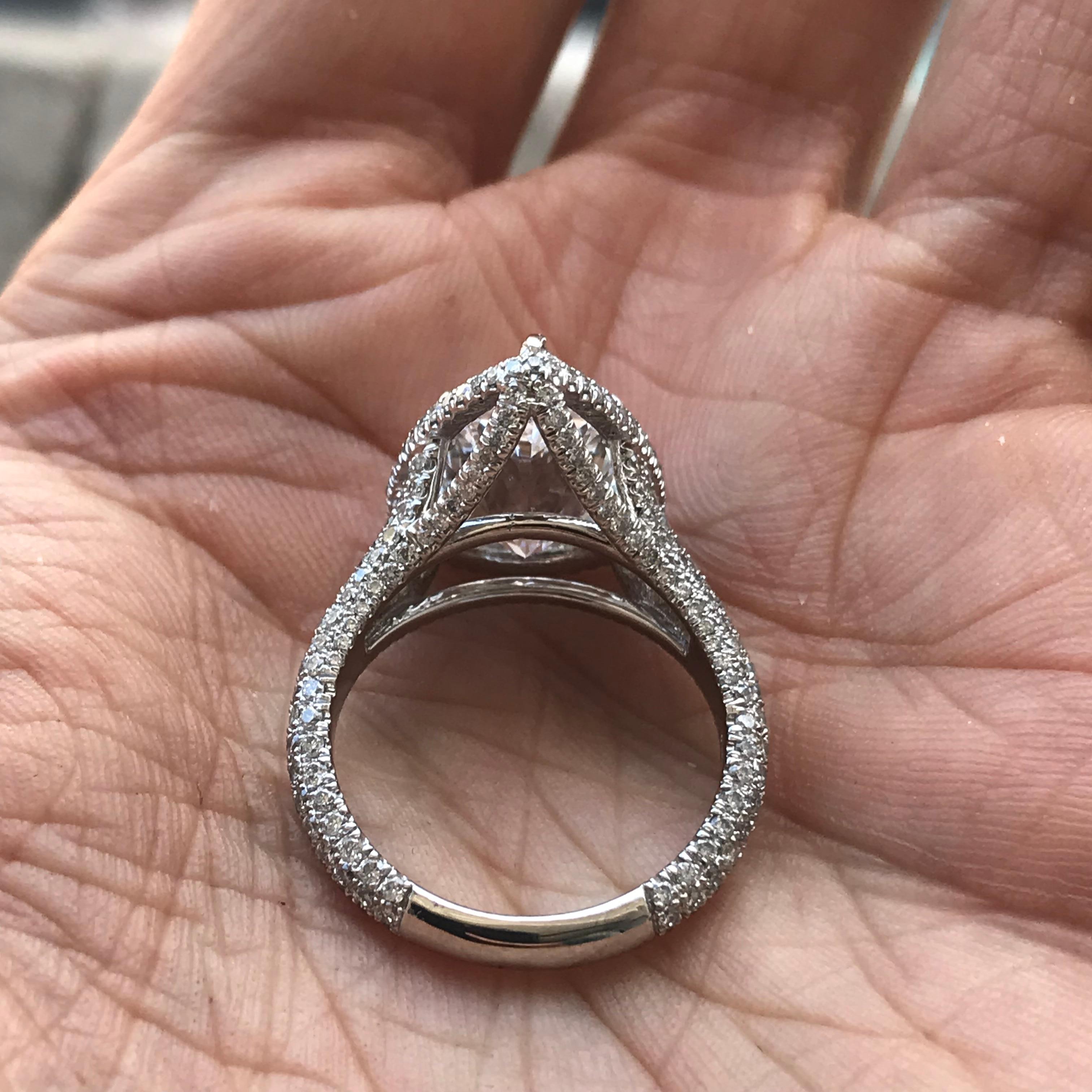 6,75 Karat birnenförmiger Verlobungsring G SI2, GIA-zertifiziert in Platin-Halo gefasst im Angebot 5