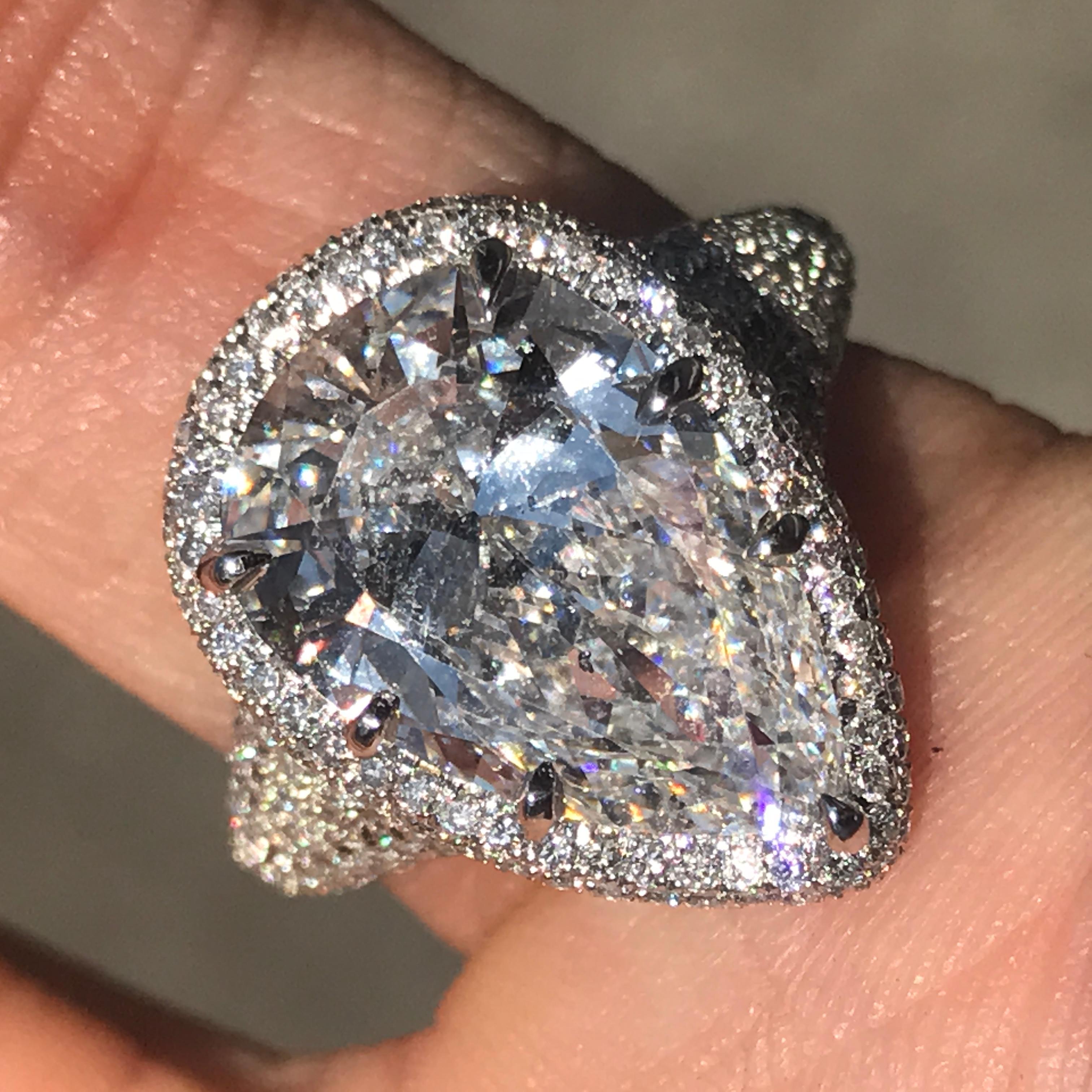Pear Shape Cut Diamond Center Stone Set In Platin W / Diamanten unten Shank Carat Total (Apprx)

Der Ring muss möglicherweise von Grund auf neu angefertigt werden, um Ihre genaue Fingergröße zu berücksichtigen. 

oder einen anderen Stein, wenn das